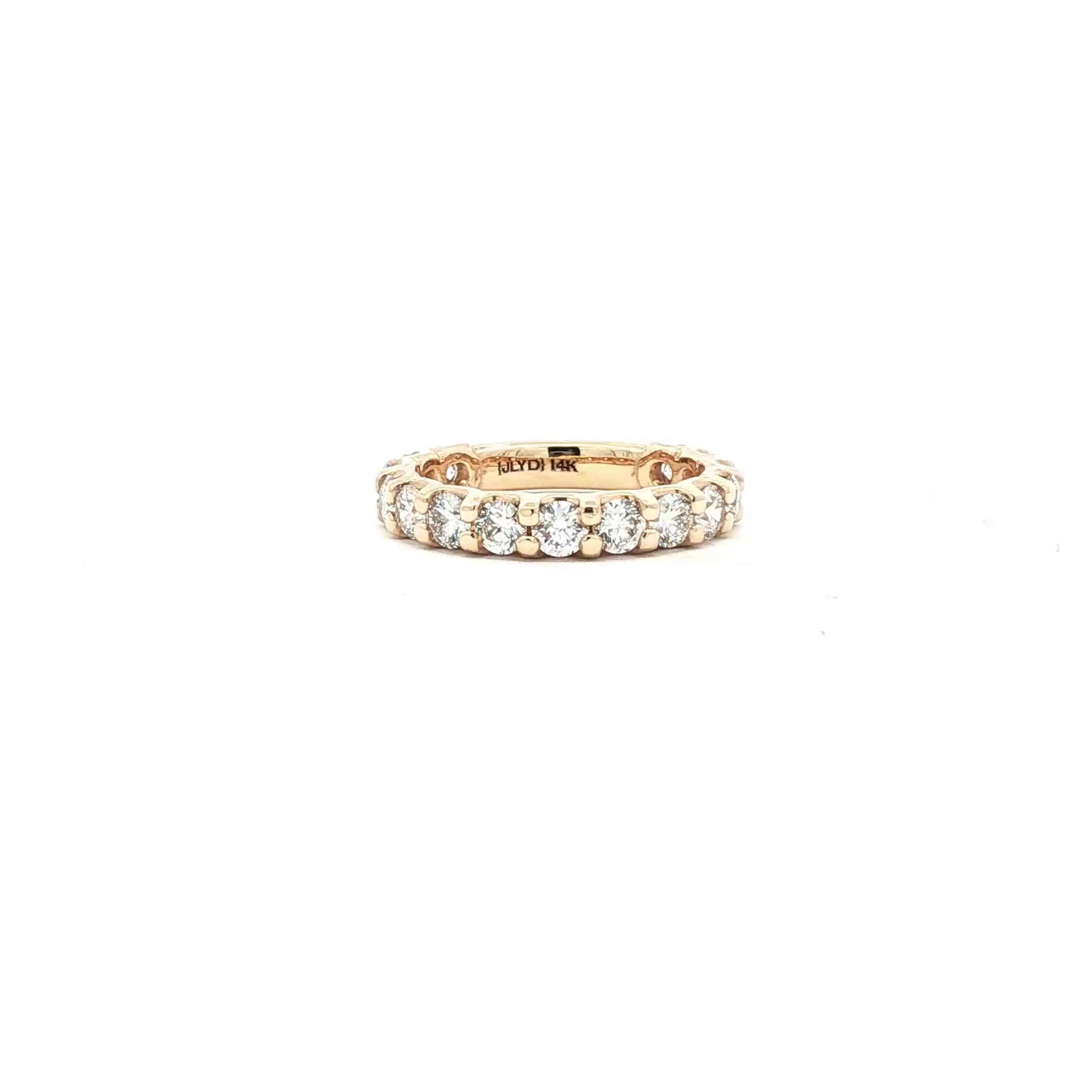 Shared prong diamond wedding ring