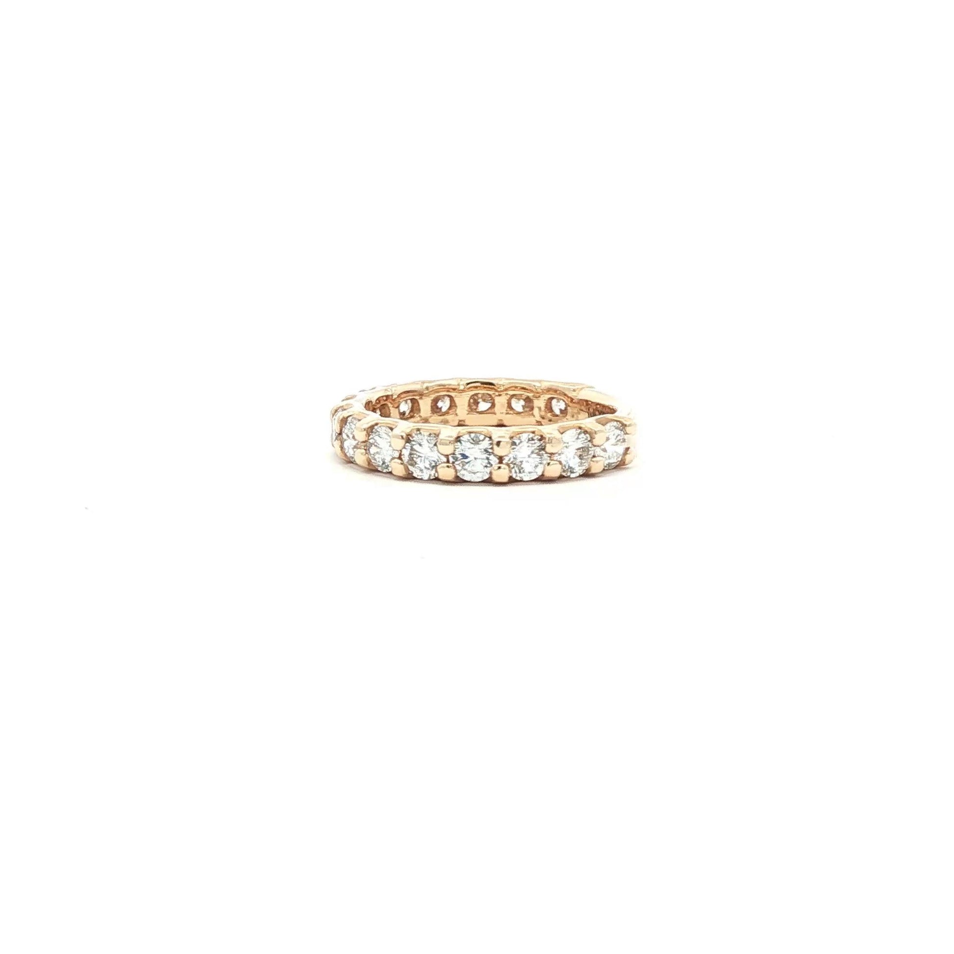 Shared prong diamond wedding ring