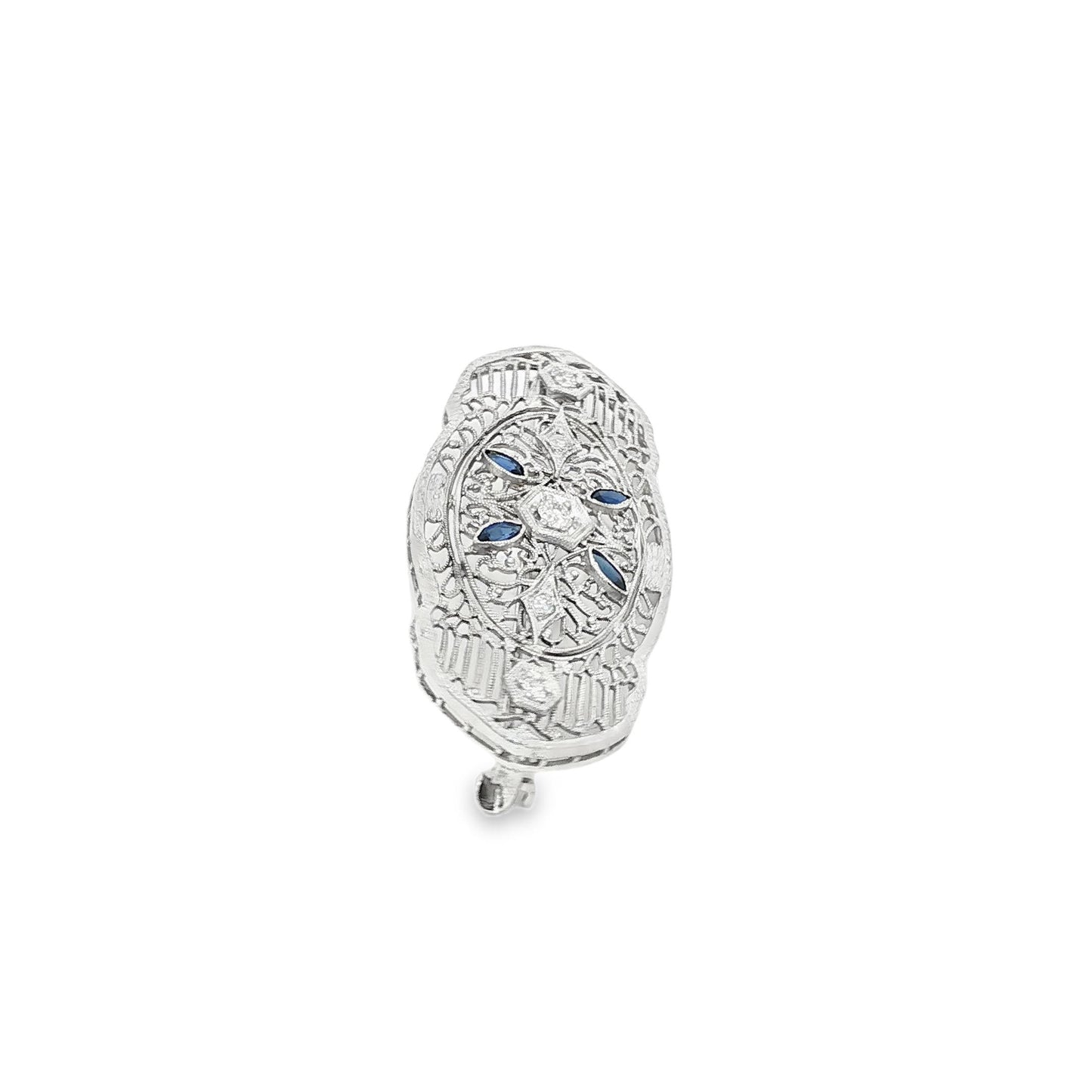 Depression filigree diamond and synthetic sapphire 14k white gold pin