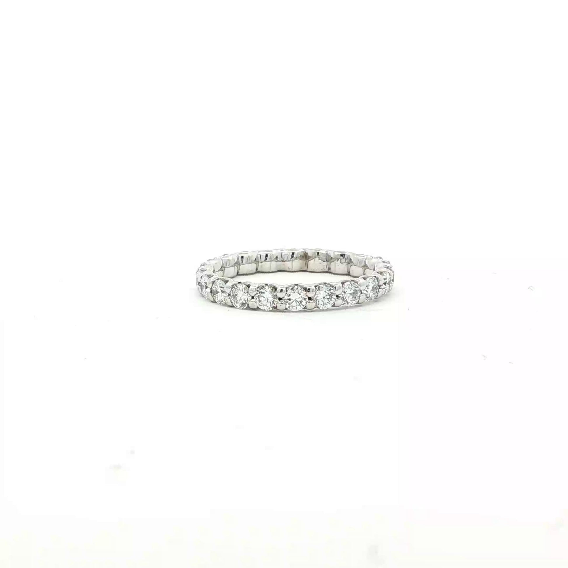 White gold shared prong diamond eternity ring