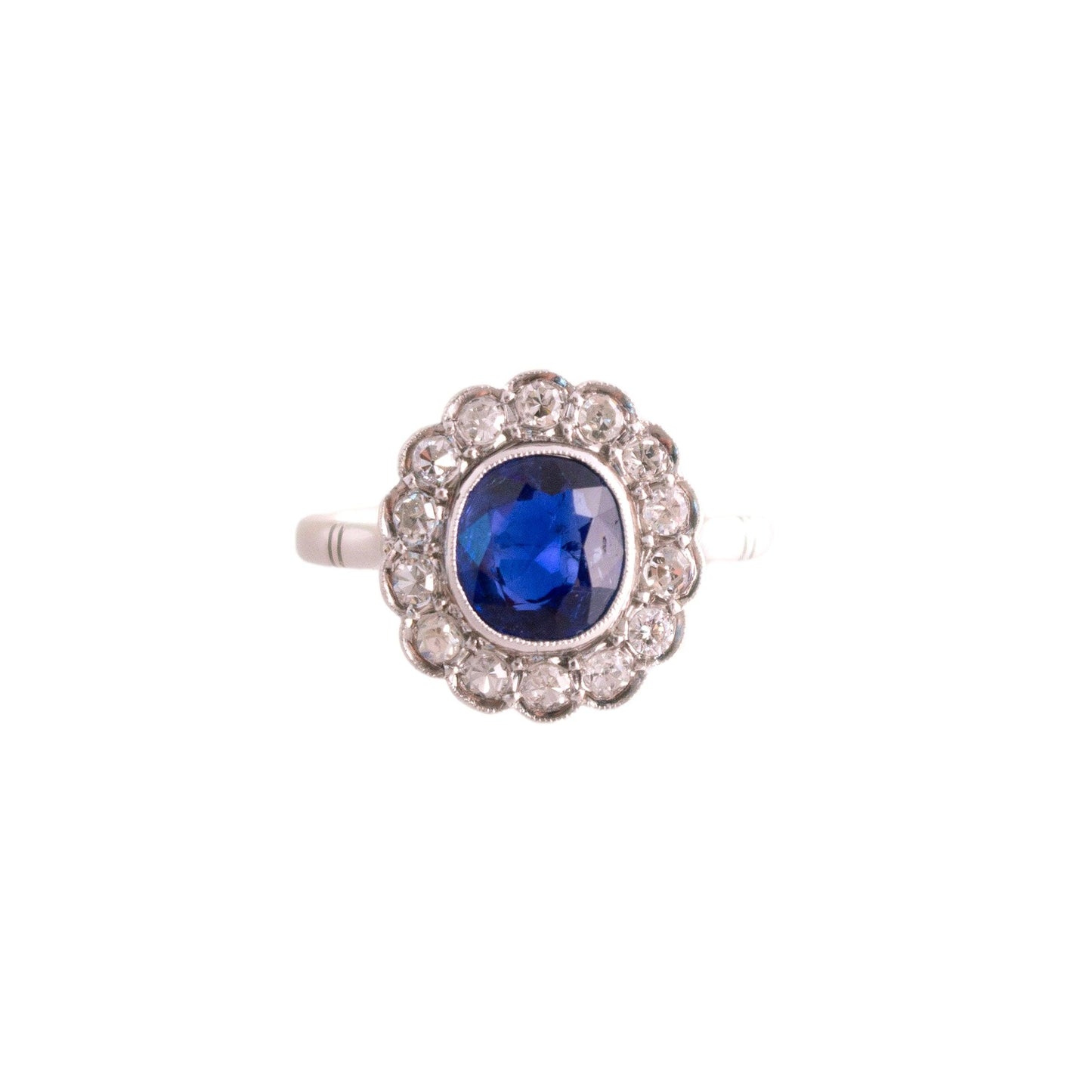 Vintage Platinum oval natural 1.25 carat Sapphire halo Ring