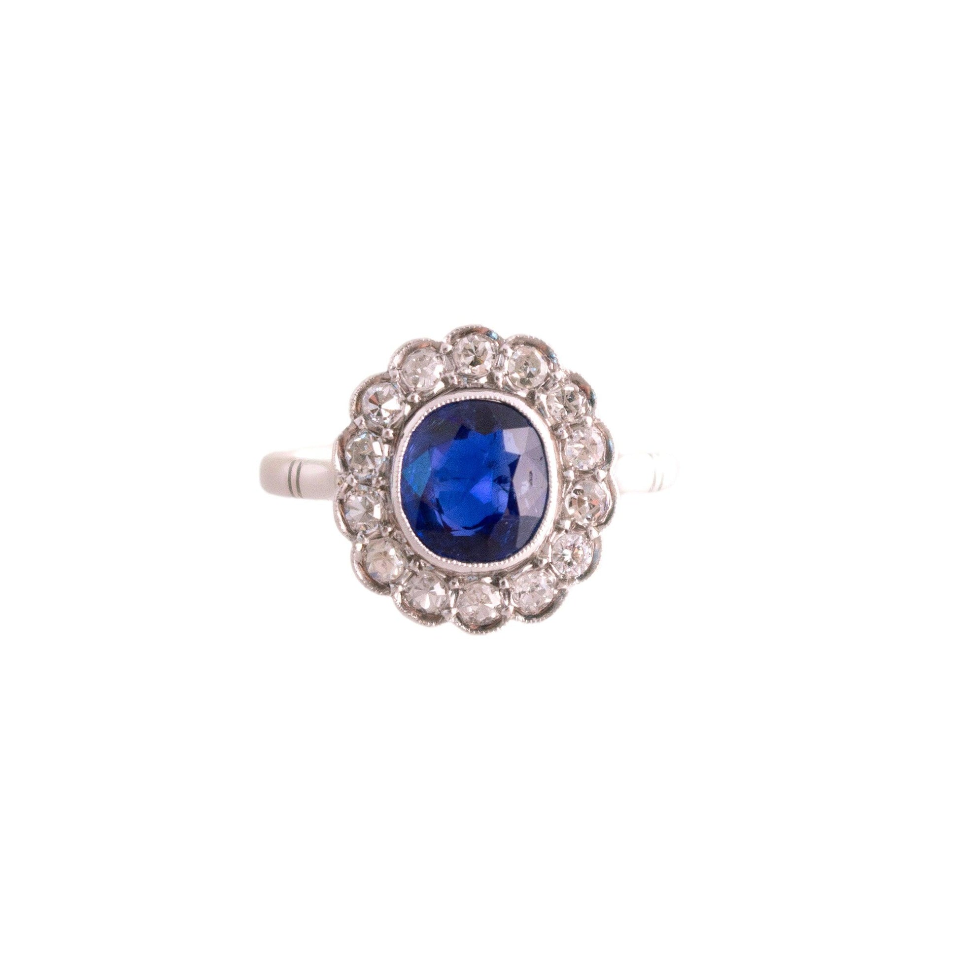 Vintage Platinum oval natural 1.25 carat Sapphire halo Ring