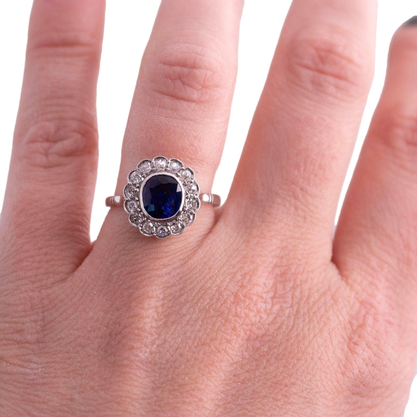 Vintage Platinum oval natural 1.25 carat Sapphire halo Ring