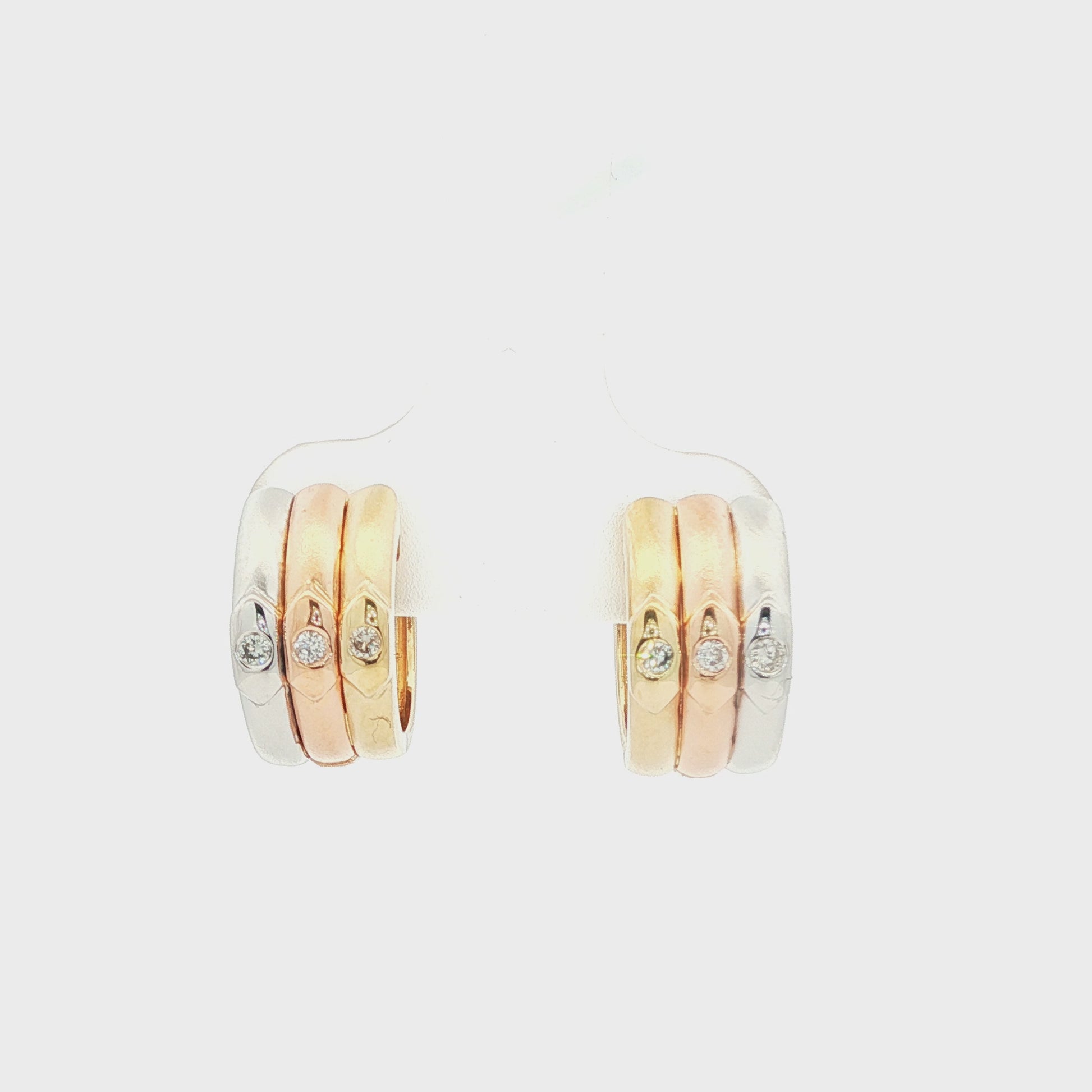 Tri colored 14k hugger style earrings with diamonds