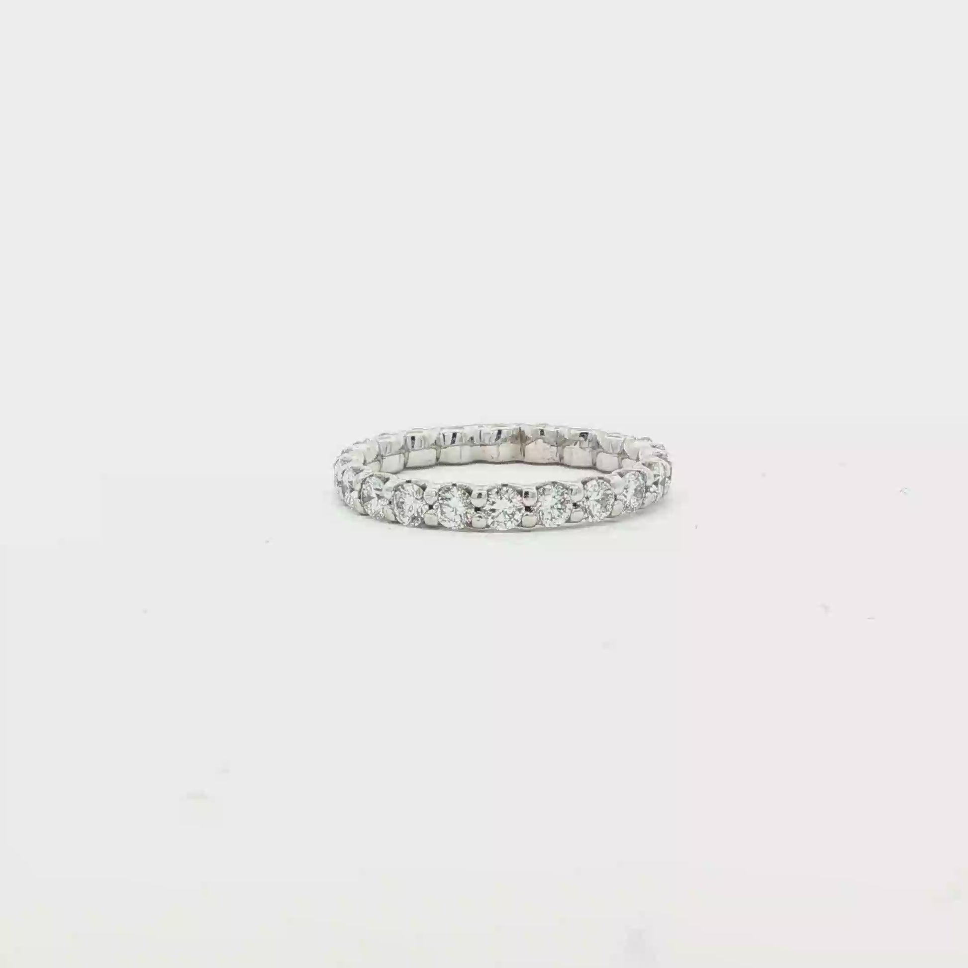 White gold shared prong diamond eternity ring