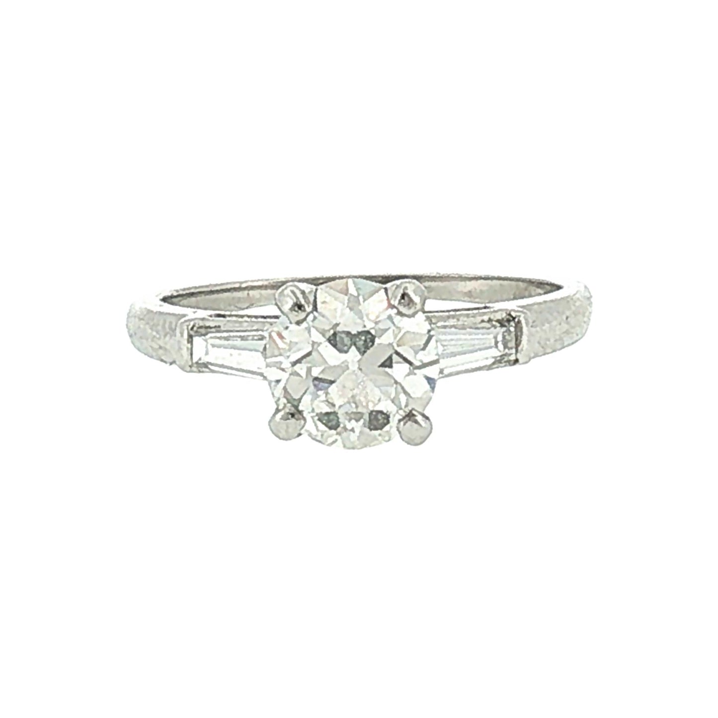 Mid-century Platinum .94 carat Old European Cut and Tapered Baguette Ring