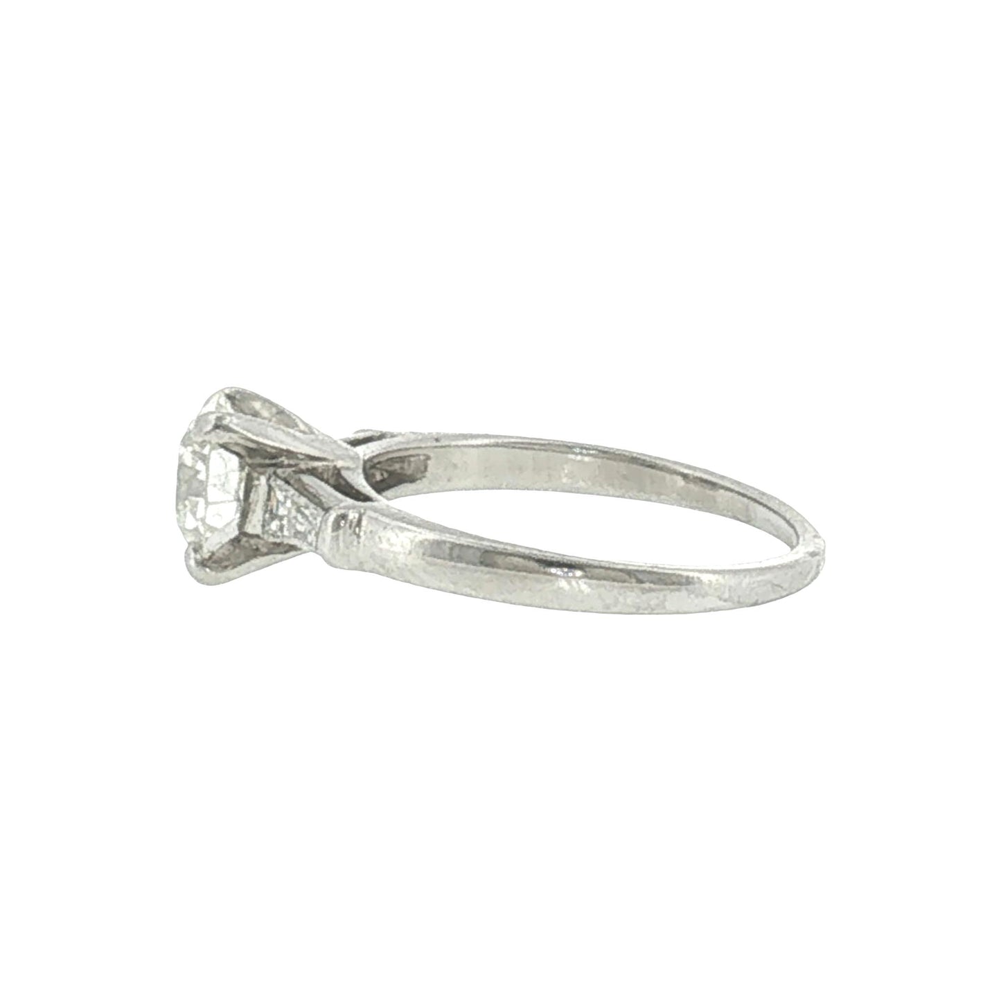 Mid-century Platinum .94 carat Old European Cut and Tapered Baguette Ring