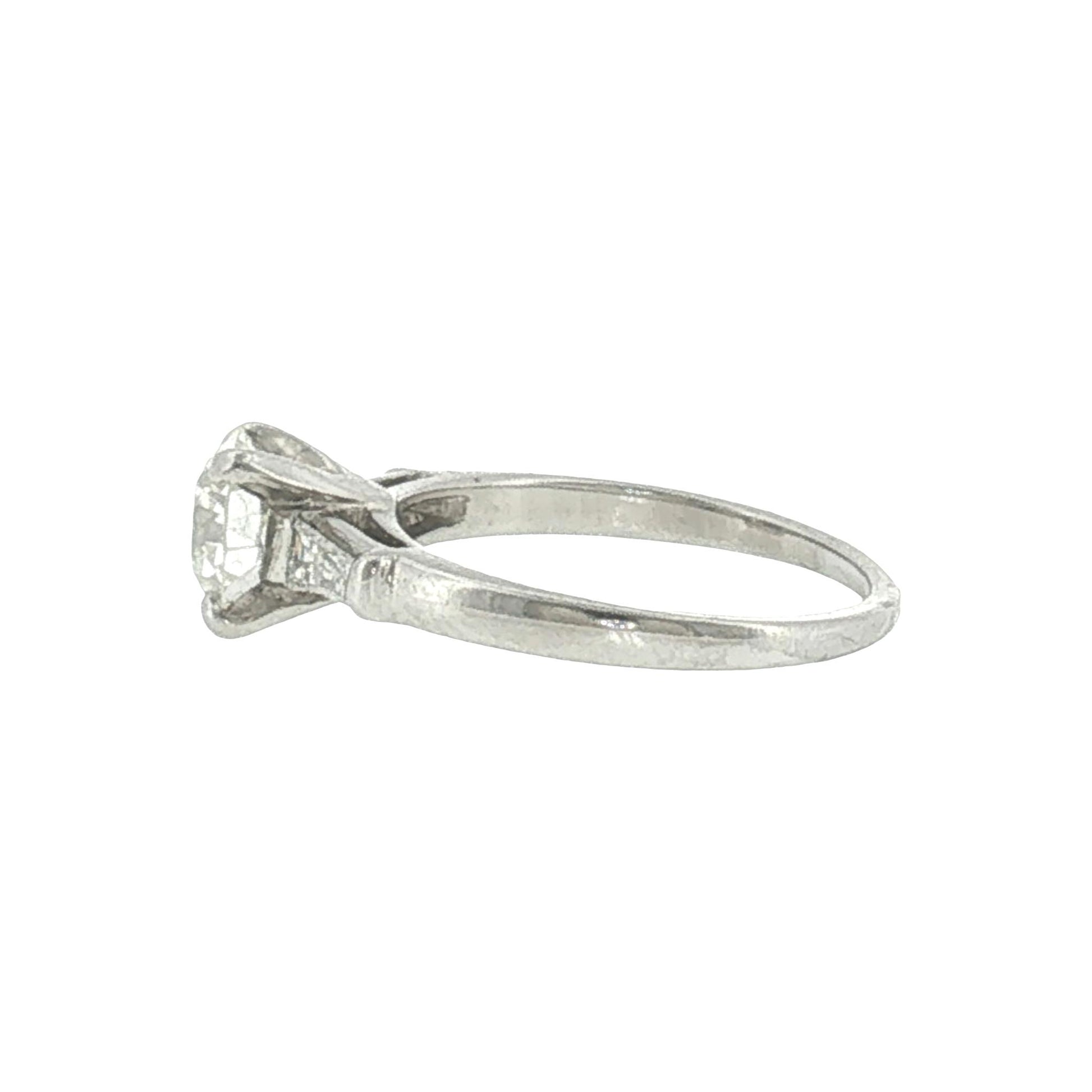 Mid-century Platinum .94 carat Old European Cut and Tapered Baguette Ring