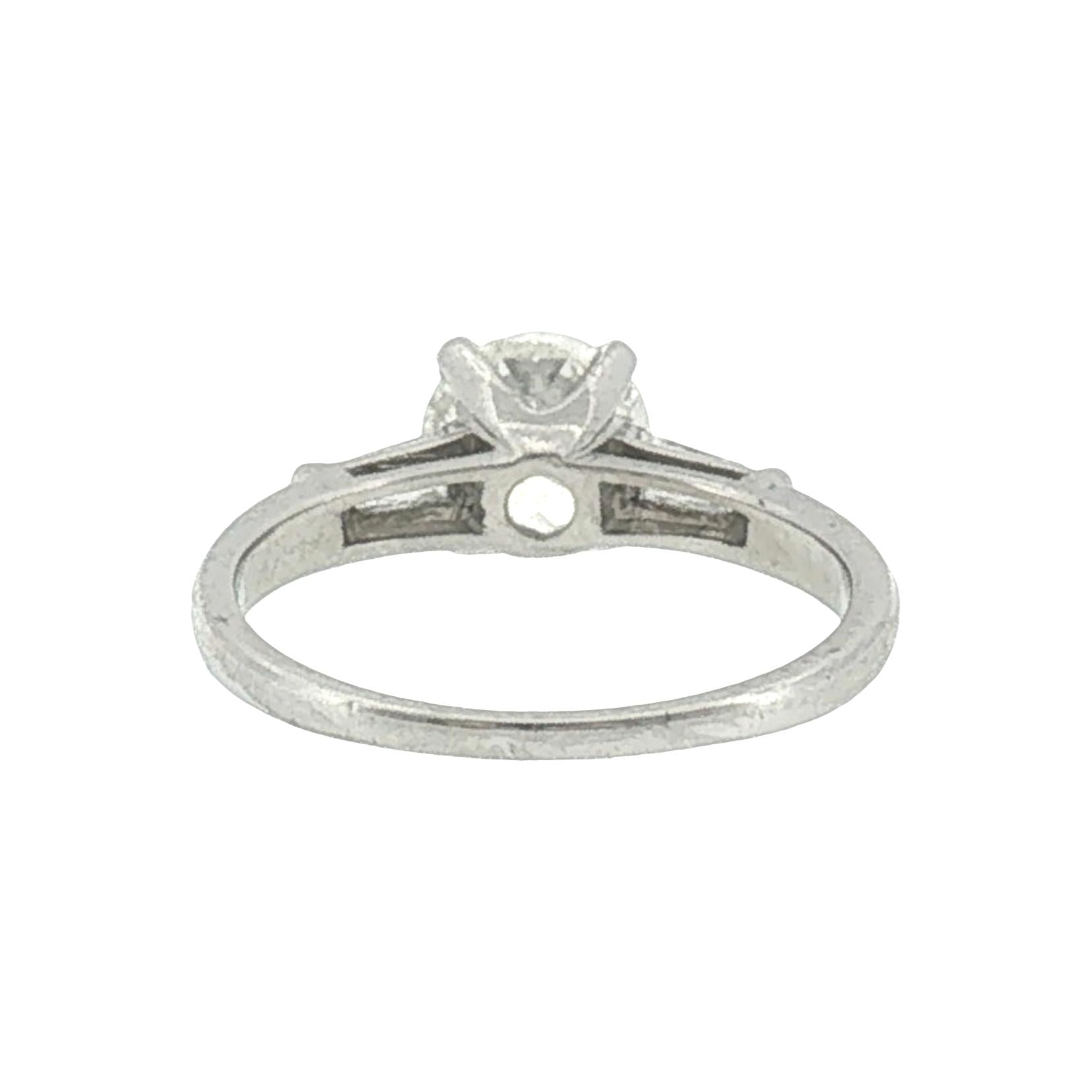 Mid-century Platinum .94 carat Old European Cut and Tapered Baguette Ring