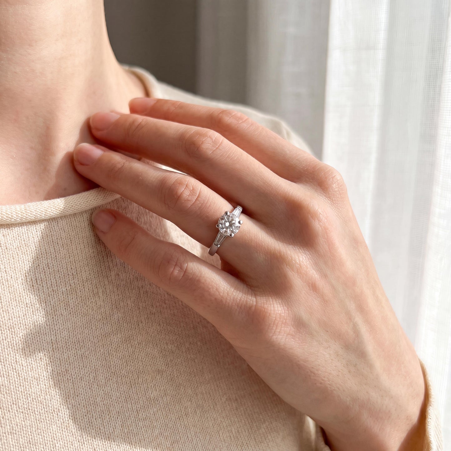 Mid-century Platinum .94 carat Old European Cut and Tapered Baguette Ring