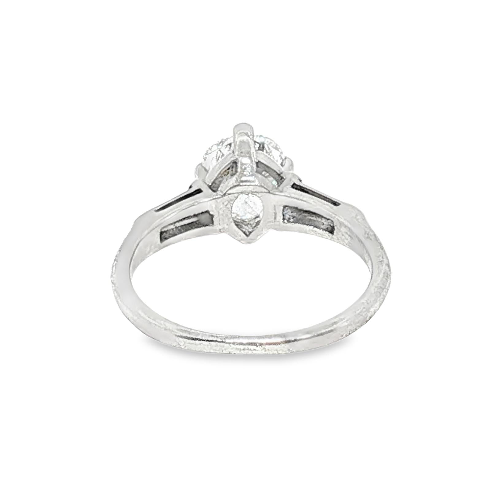 Mid Century Platinum Approximately 1 Carat Pearshape Classic Engagement Ring
