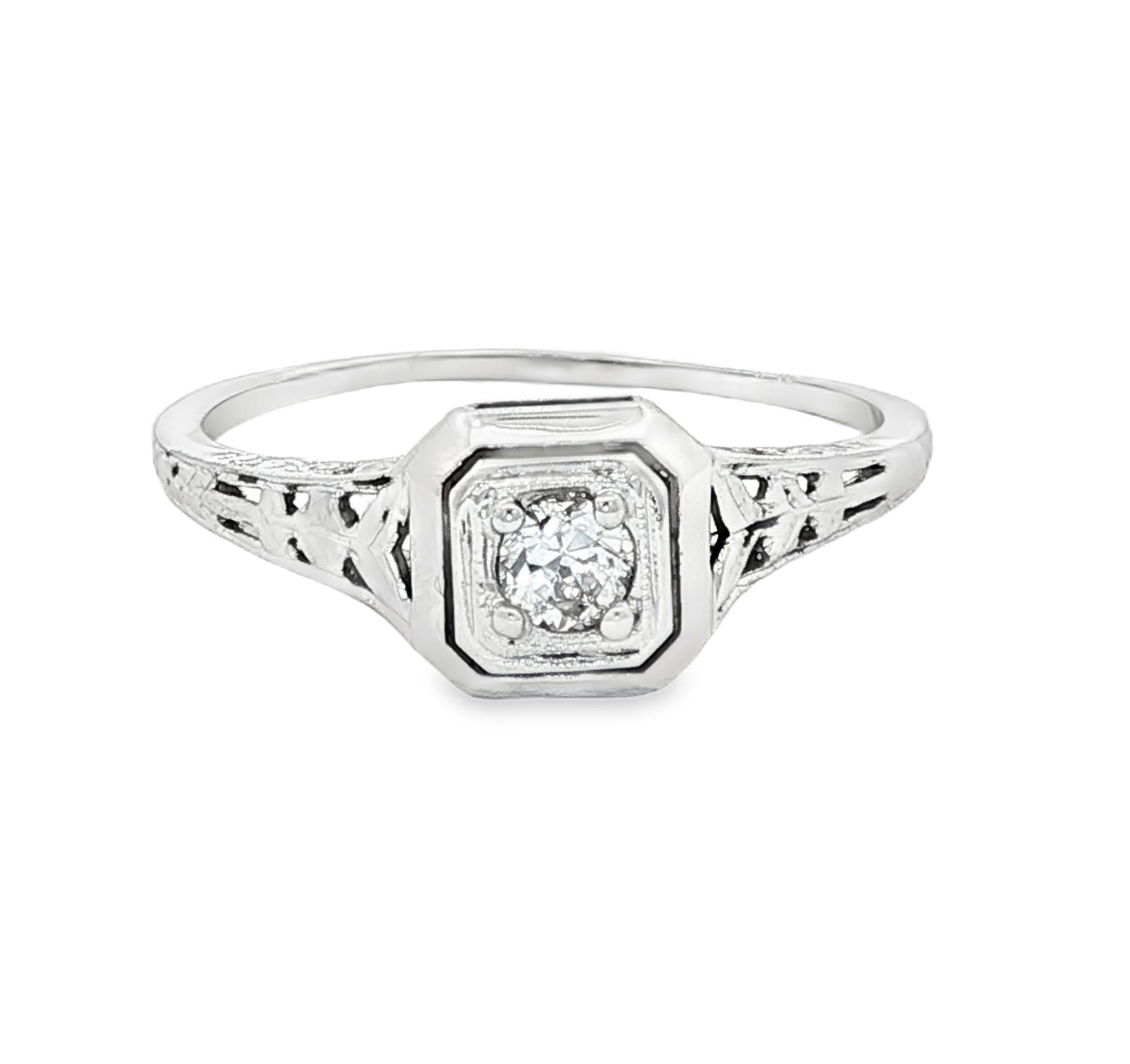 18k white gold .07 carat old mine cut engagement ring