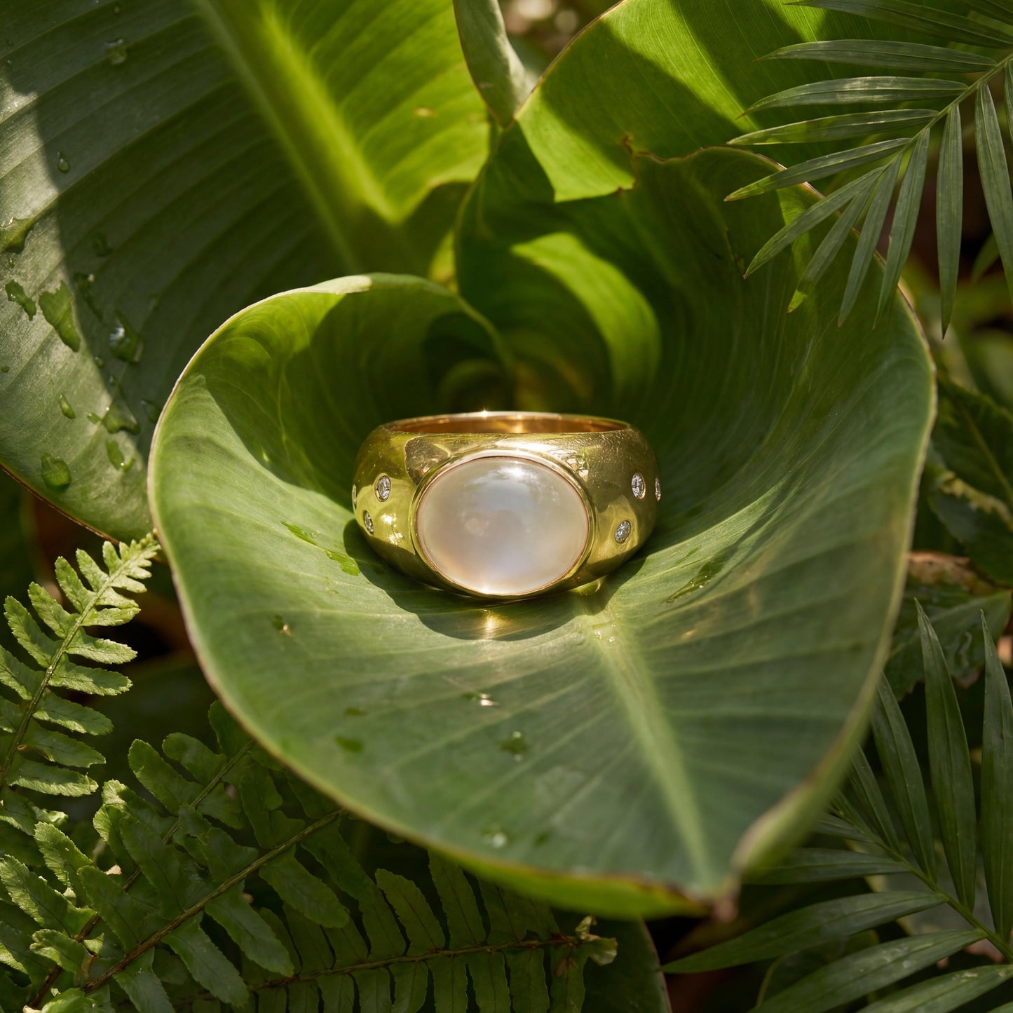 A Vintage 14k yellow gold Moonstone and Diamond Dome Ring