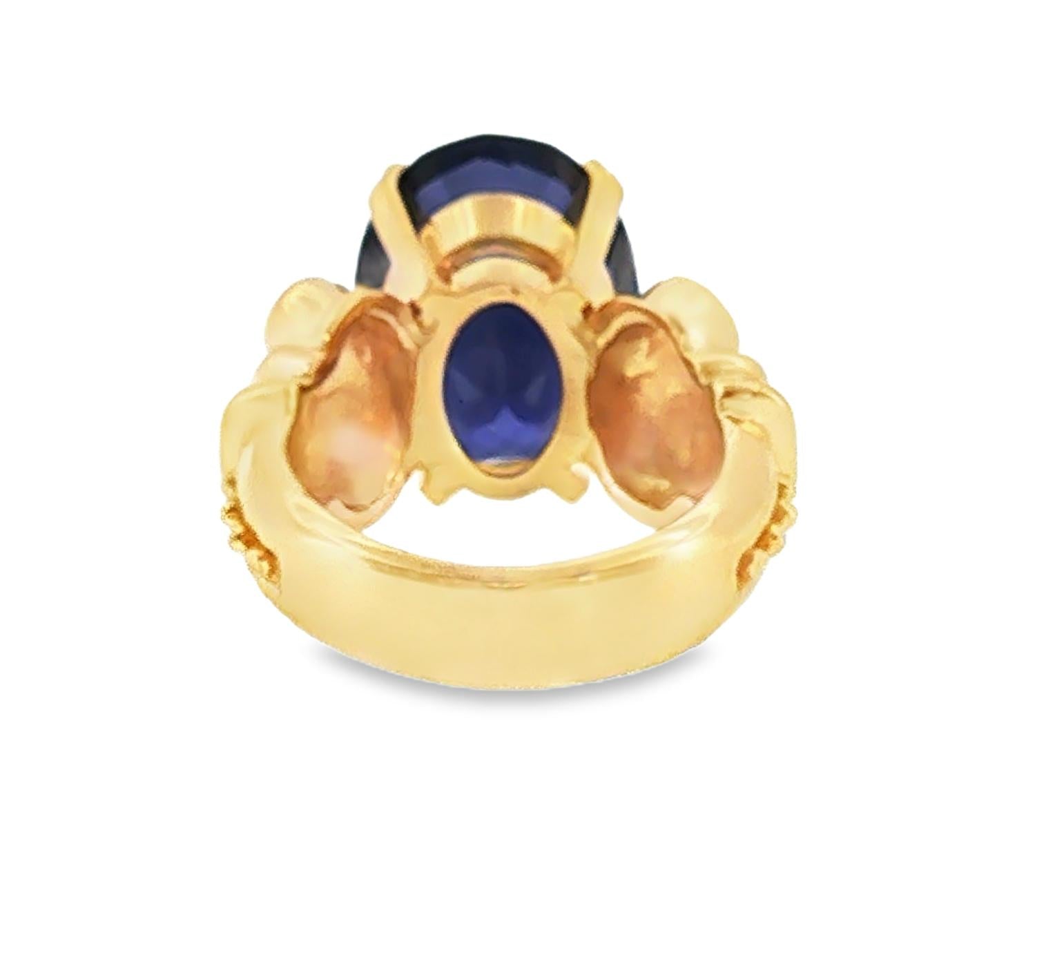 Late 20th Century 14k Yellow Gold 7 Carat Oval Iolite Column Style Ring