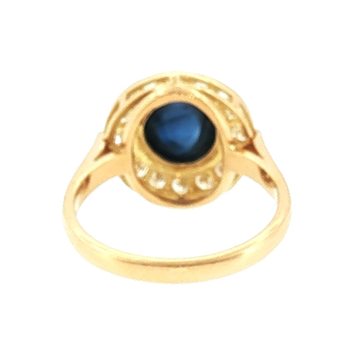 Late 20th-Century 18 Karat Yellow Gold Cabochon Blue Sapphire Halo Ring
