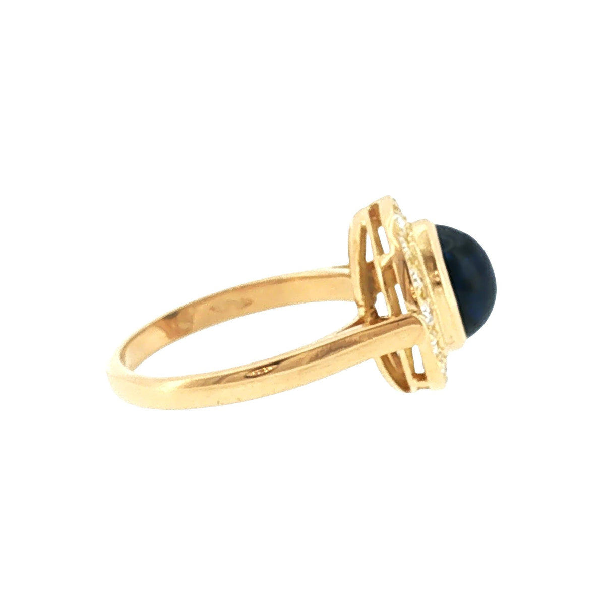 Late 20th-Century 18 Karat Yellow Gold Cabochon Blue Sapphire Halo Ring