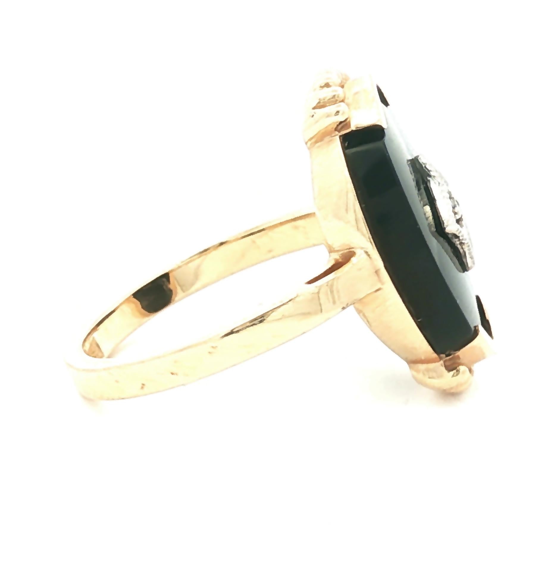 Mid-Century 10 karat yellow gold Black Onyx and Diamond Ring