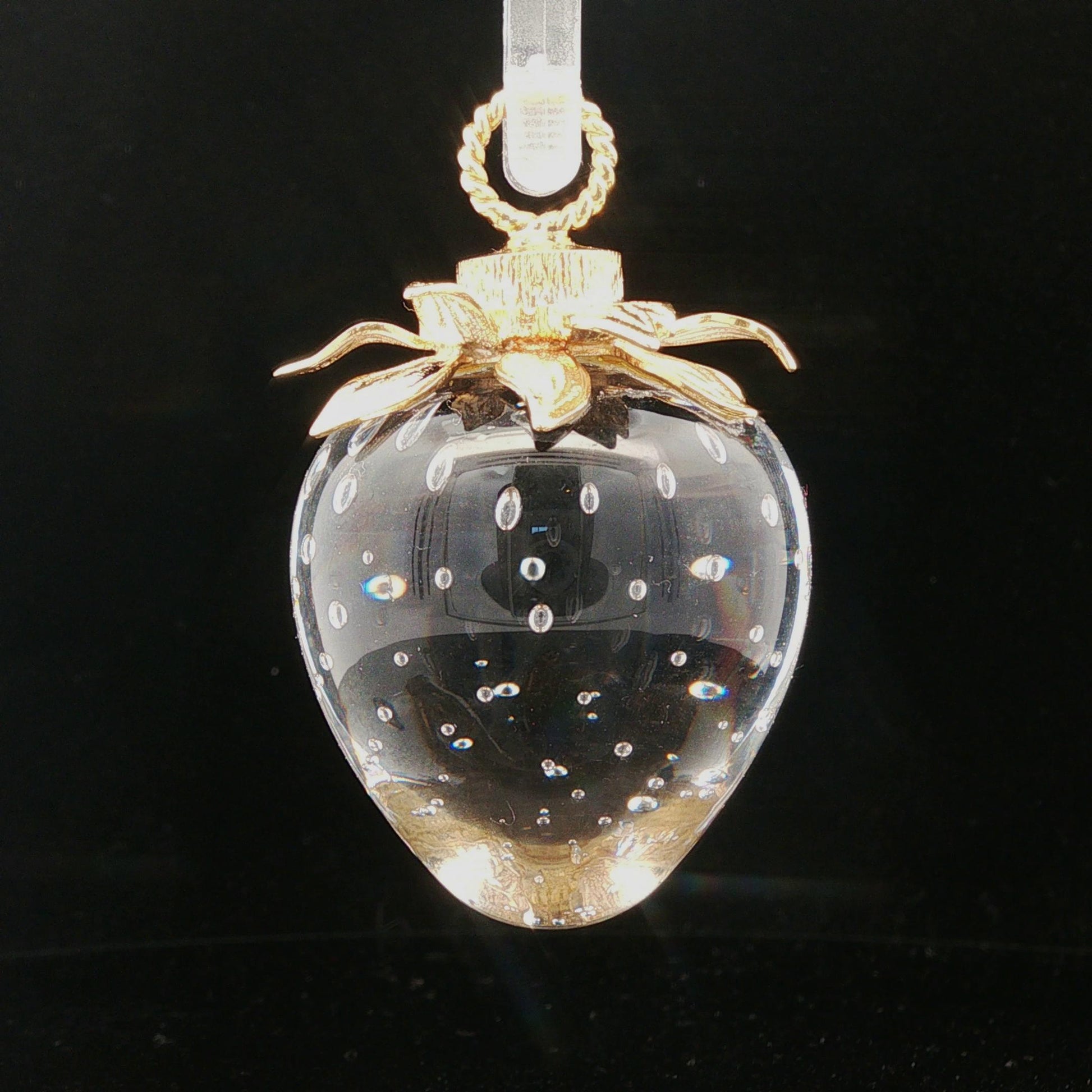 Stueben art glass strawberry with 18k petal cap