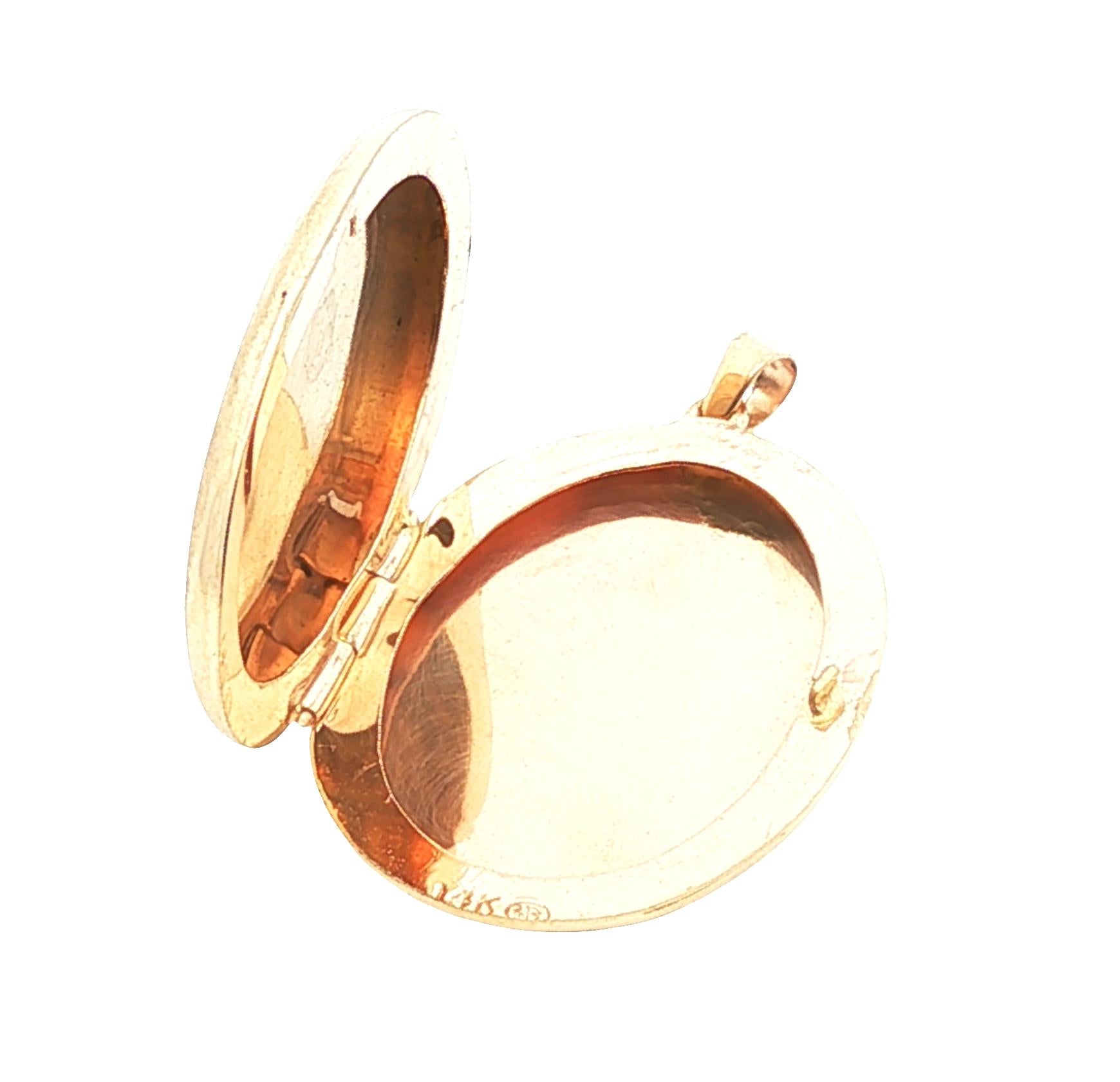 Vintage 14k yellow gold Oval Plain Locket