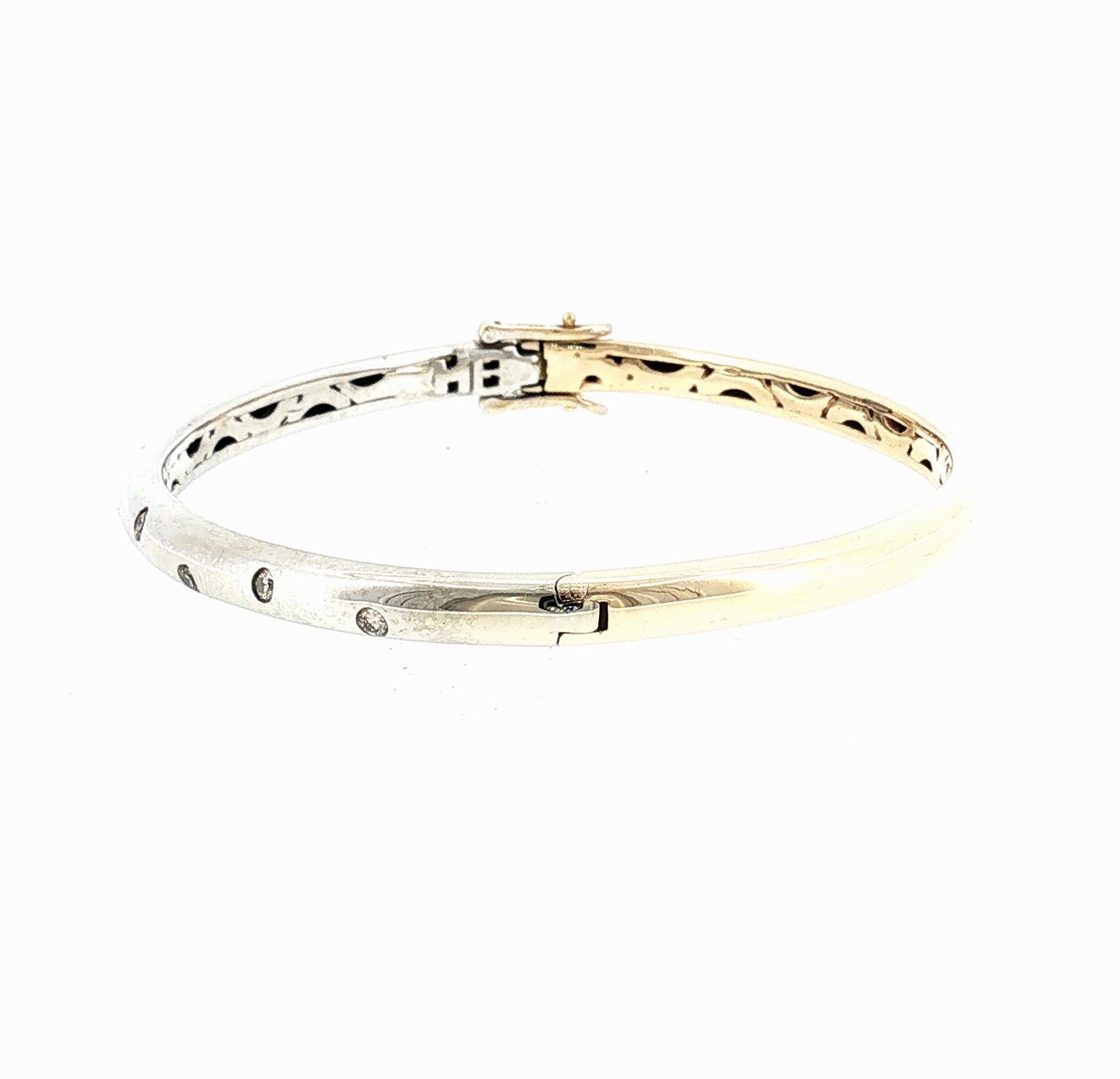 Late 20th Century 14 karat Two Tone Flush Set Diamond Hinged Bracelet