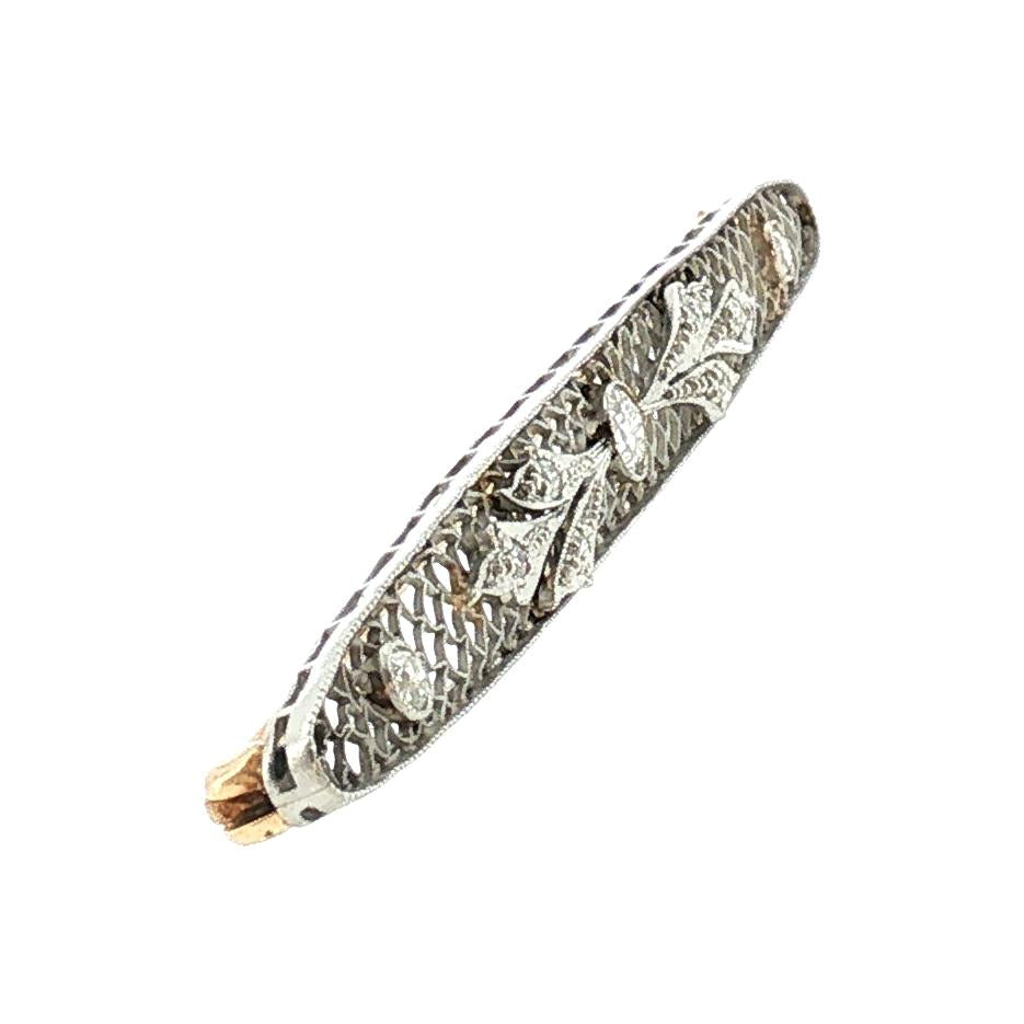Early 20th-Century Platinum Over Gold 9 Diamond Filigree Bar Pin
