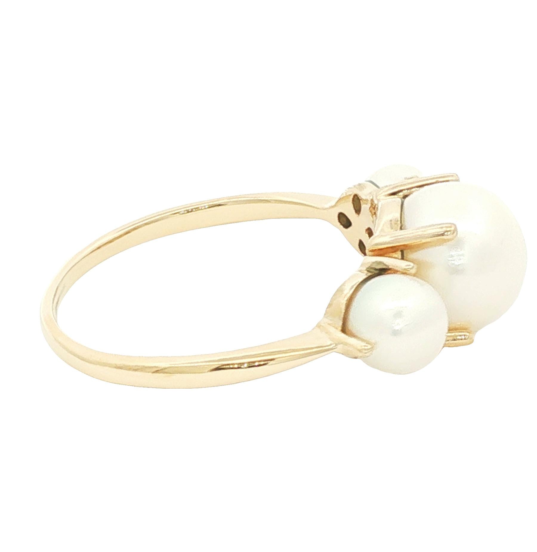 14k yellow gold 3 cultured pearl prong set ring