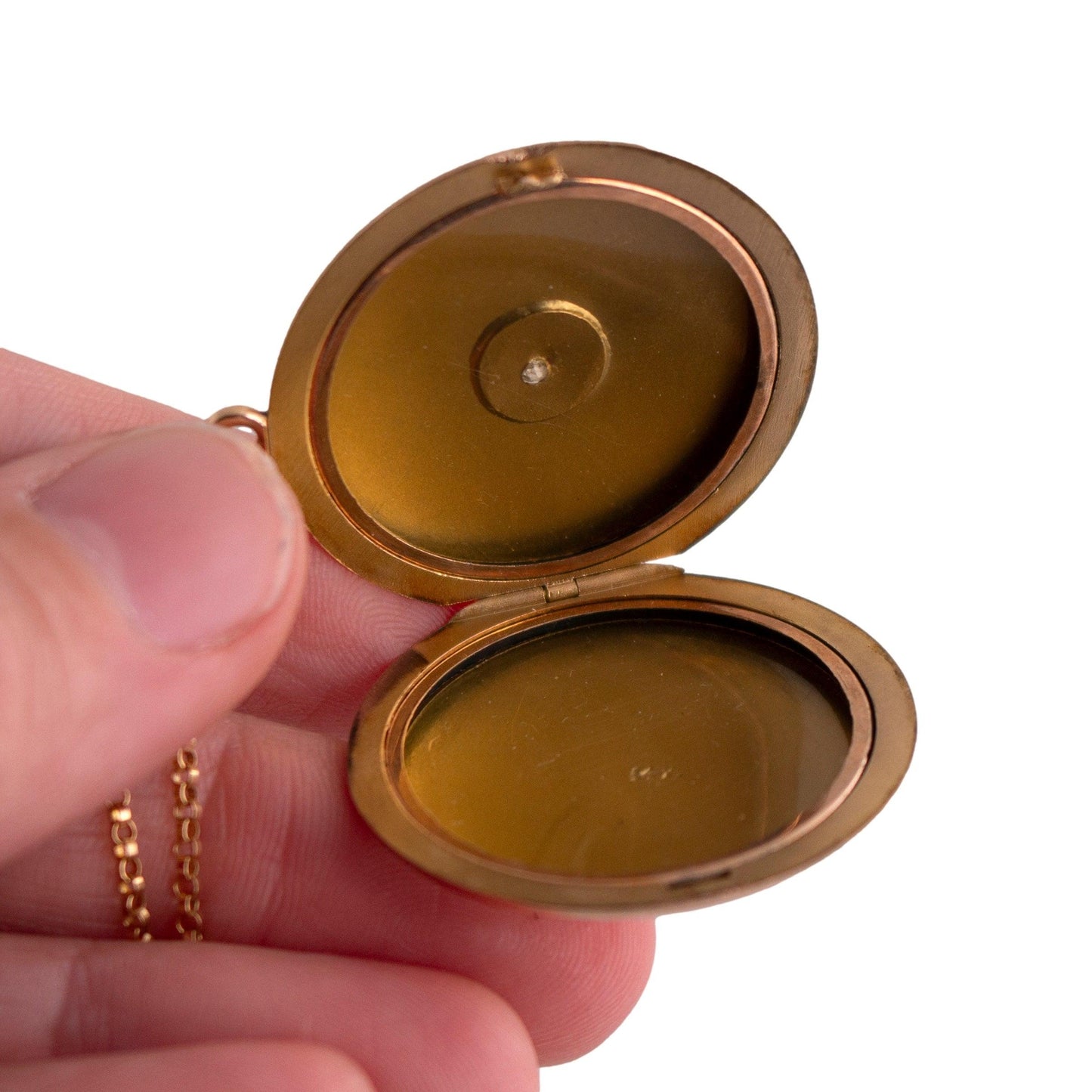 Antique 14k yellow gold Round Locket Necklace with a Star Set Mine Cut Diamond