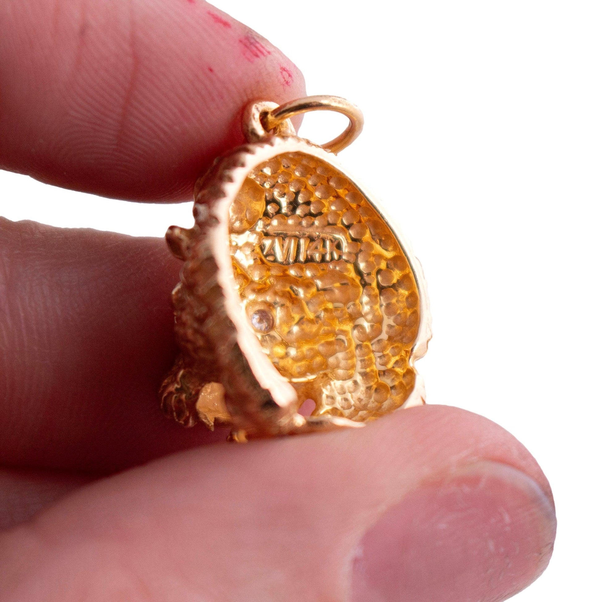 14k yellow gold cast Lion Head Charm with Diamond Eyes