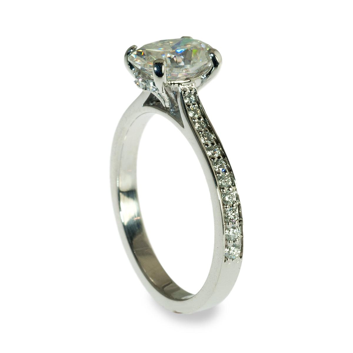 Oval center hidden halo engagement ring