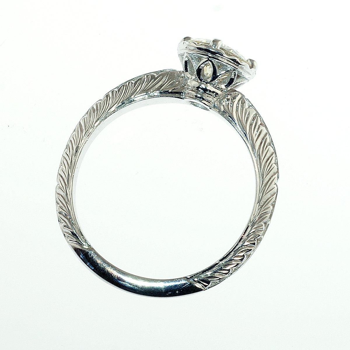 Vintage styled scalloped head engagement ring