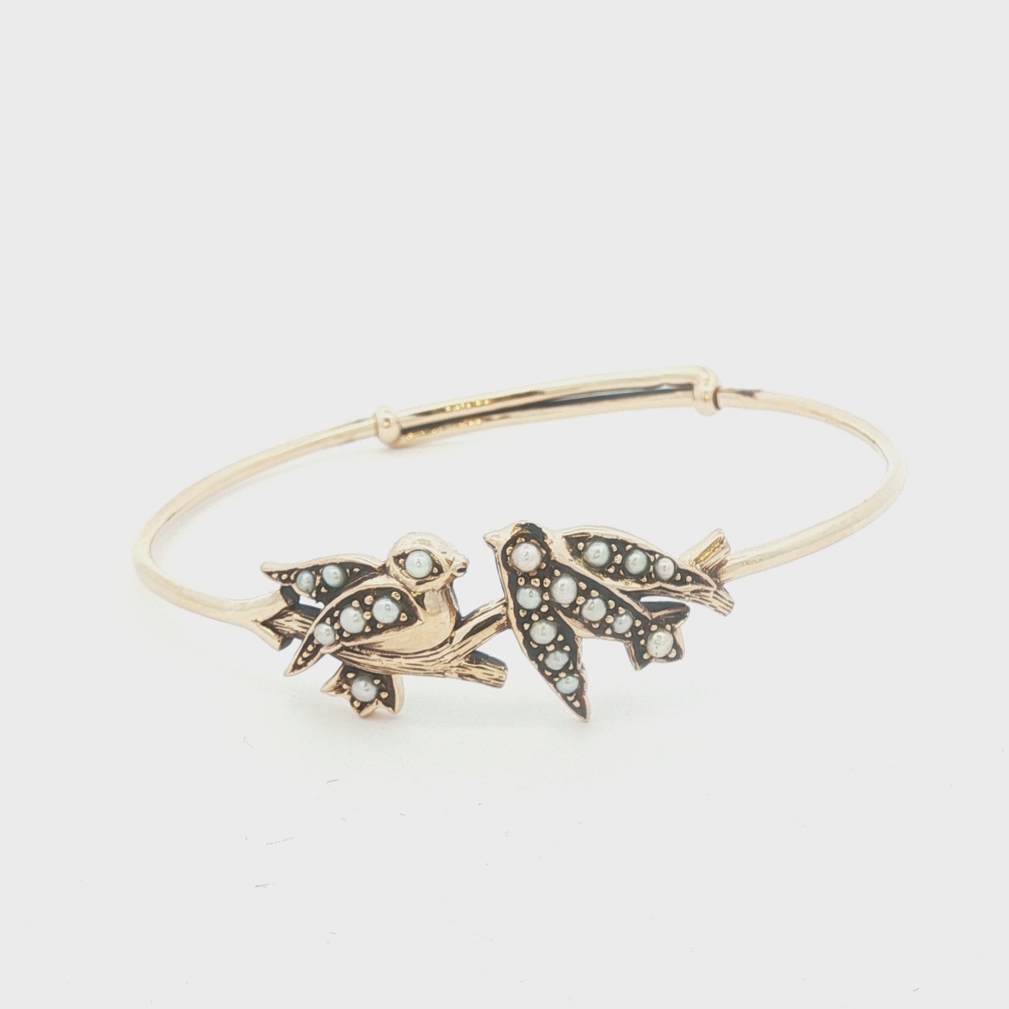 9 karat yellow gold Love Birds with Seed Pearls bangle bracelet