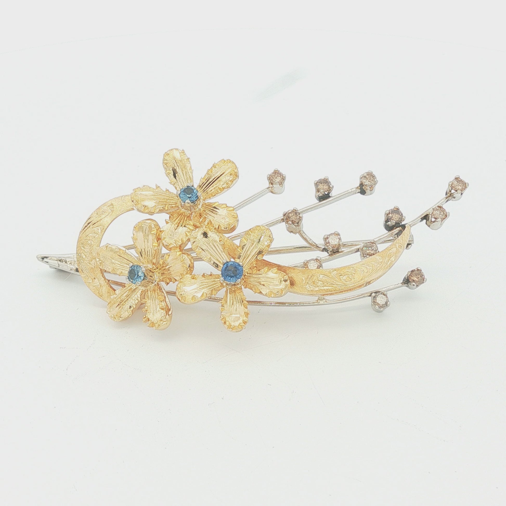 18k two tone blue sapphire and brown diamond hand engraved spray brooch