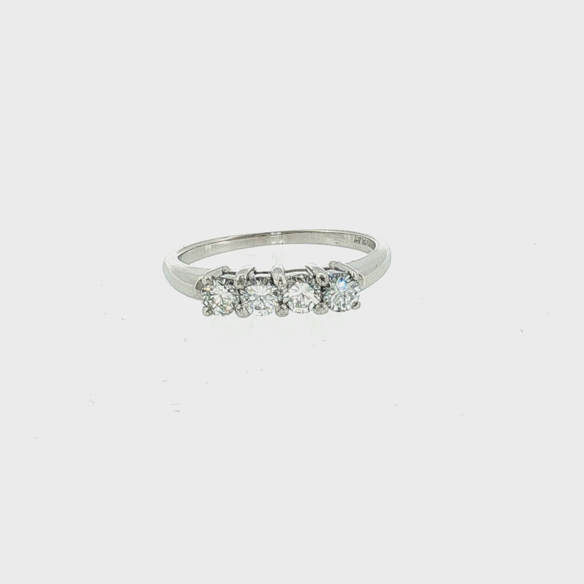 Late 20th-Century Platinum 4 Brilliant Cut Diamond Wedding Ring