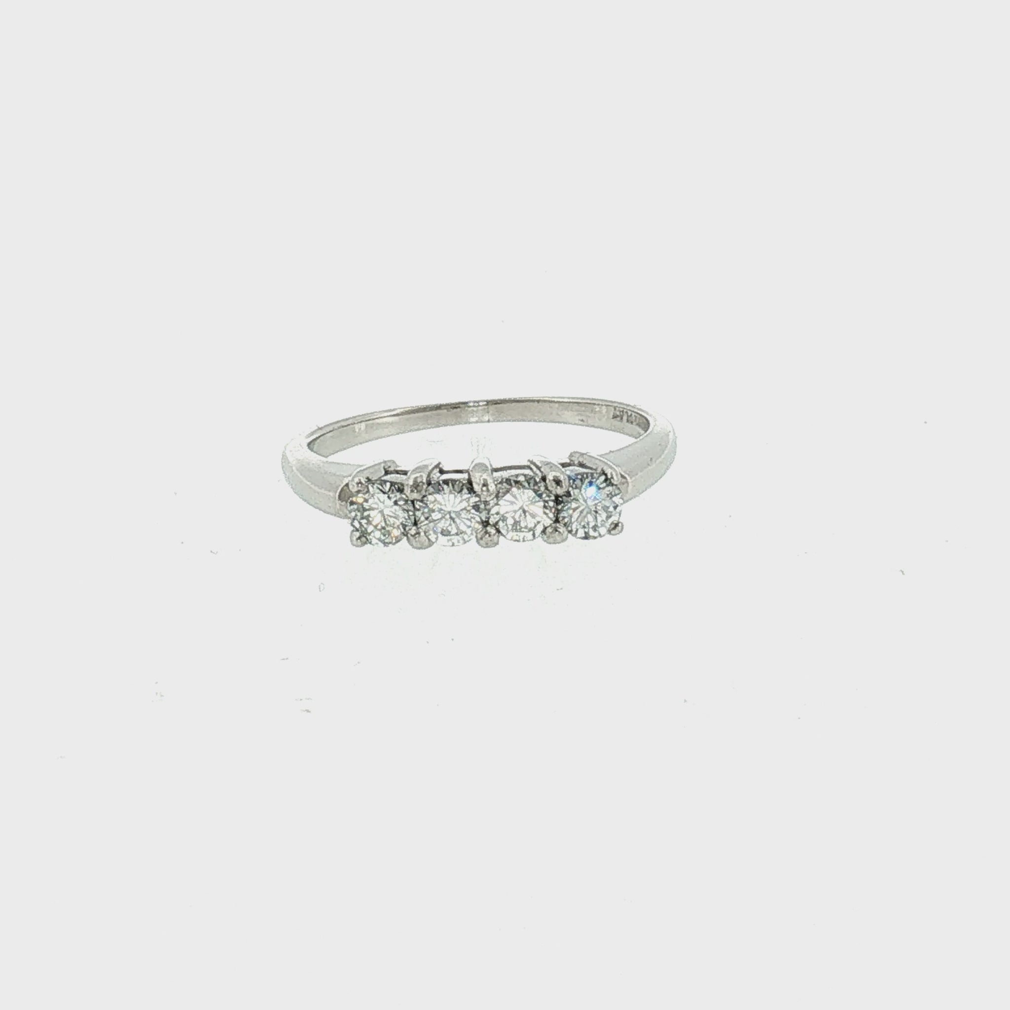 Late 20th-Century Platinum 4 Brilliant Cut Diamond Wedding Ring