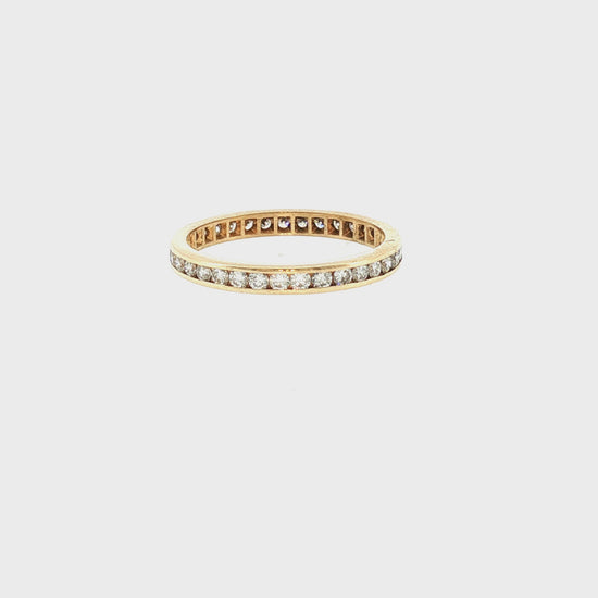 Late 20th-Century 14 Karat Yellow Gold 35 Natural Diamond Channel Eternity Band