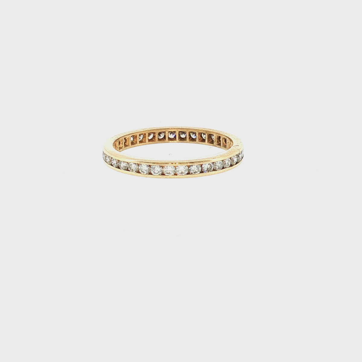 Late 20th-Century 14 Karat Yellow Gold 35 Natural Diamond Channel Eternity Band