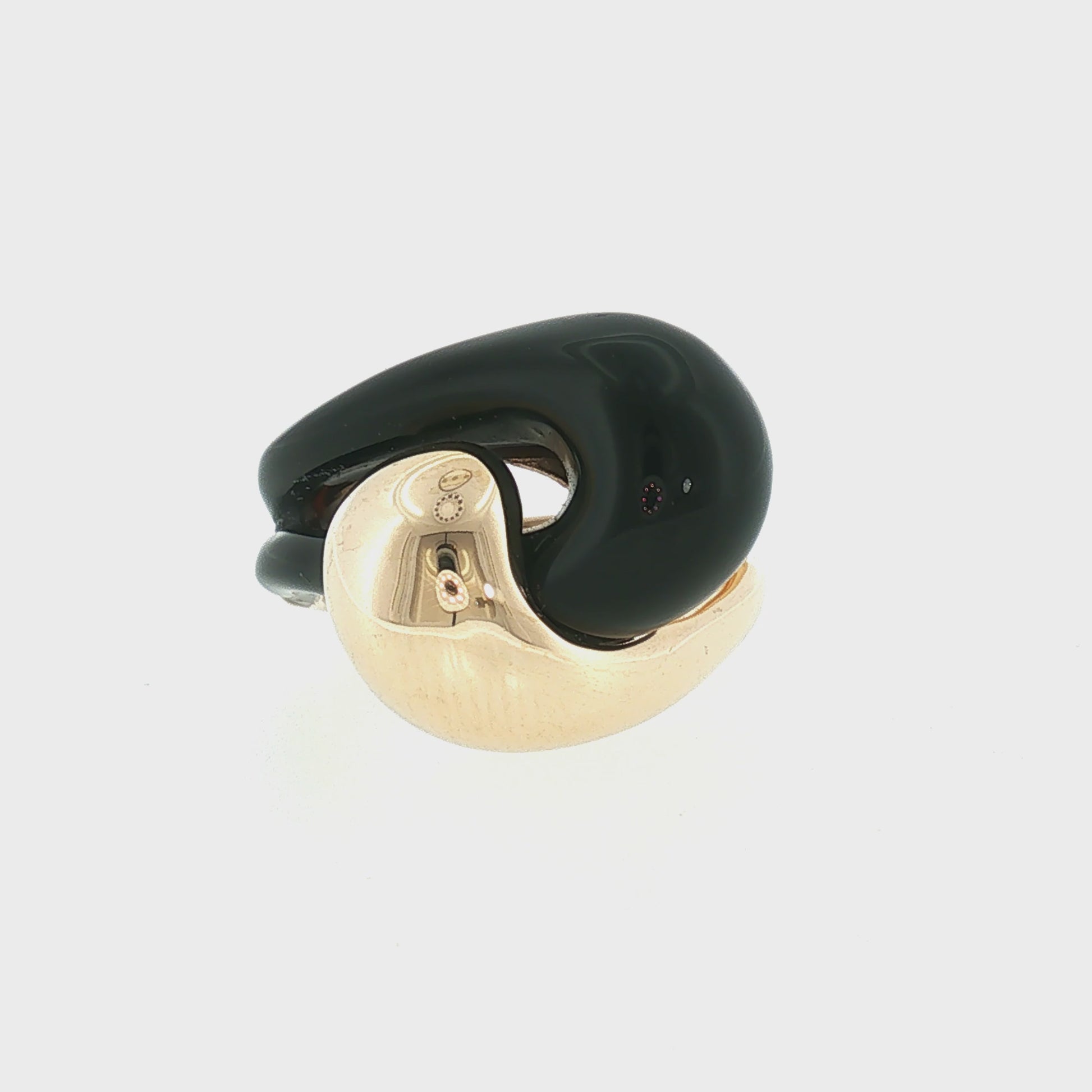 Late 20th Century 14k Yellow Gold Black Onyx Offset Knot Ring