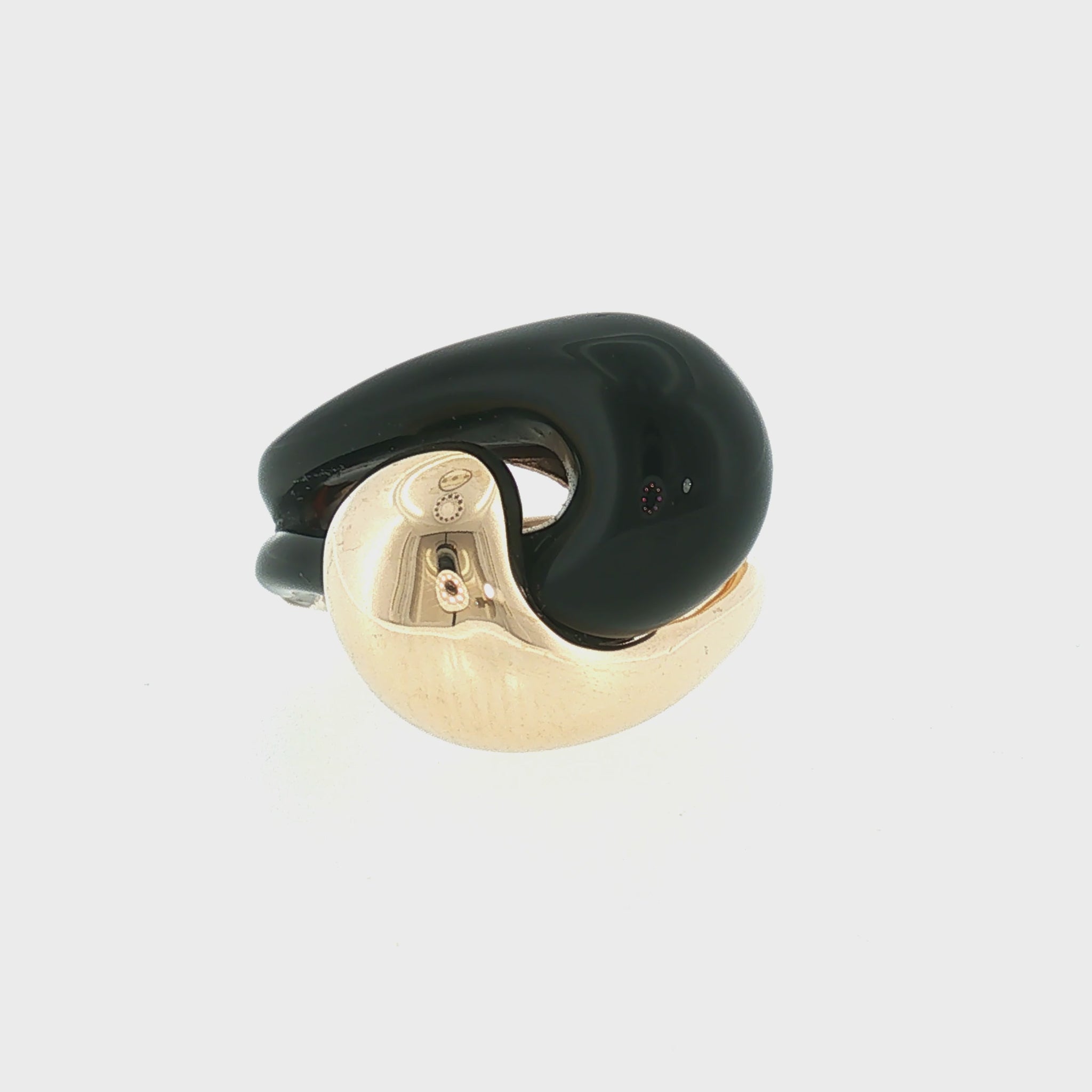 Late 20th Century 14k Yellow Gold Black Onyx Offset Knot Ring
