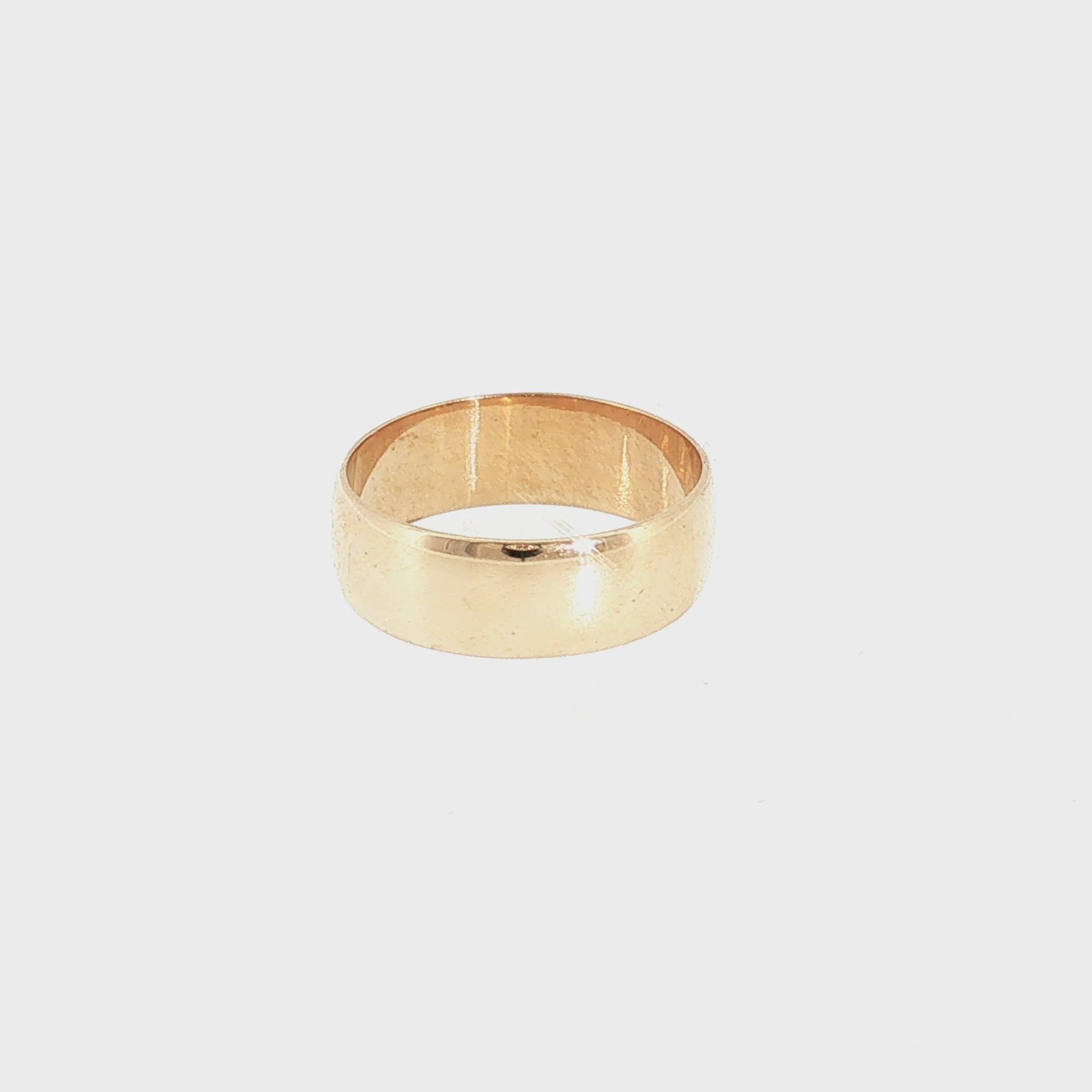 A Late 19th-Century 9 Karat Rosie Yellow Gold 7mm Wedding ring