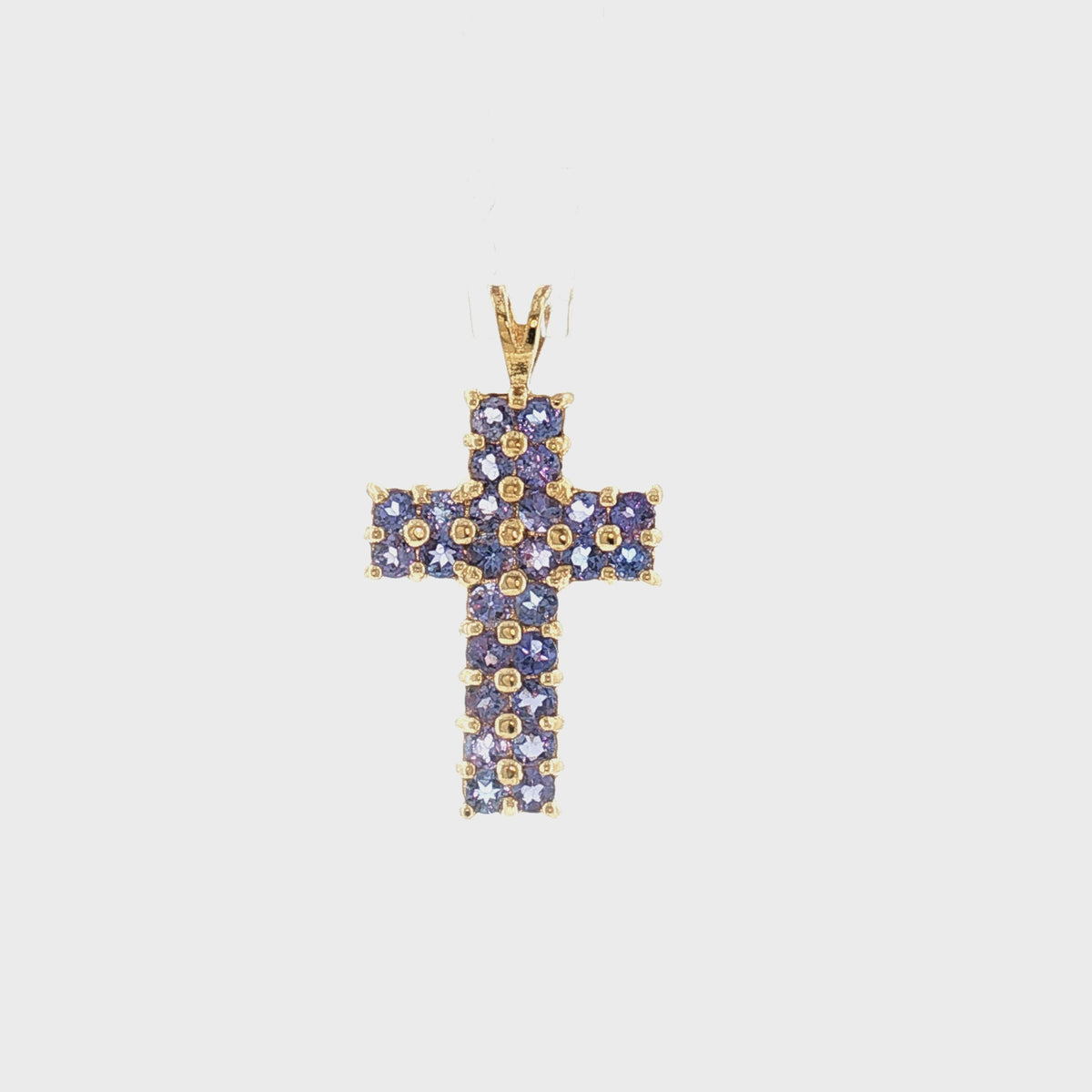 Late 20th-Century 14 Karat Yellow Gold Natural Tanzanite Cross Pendant