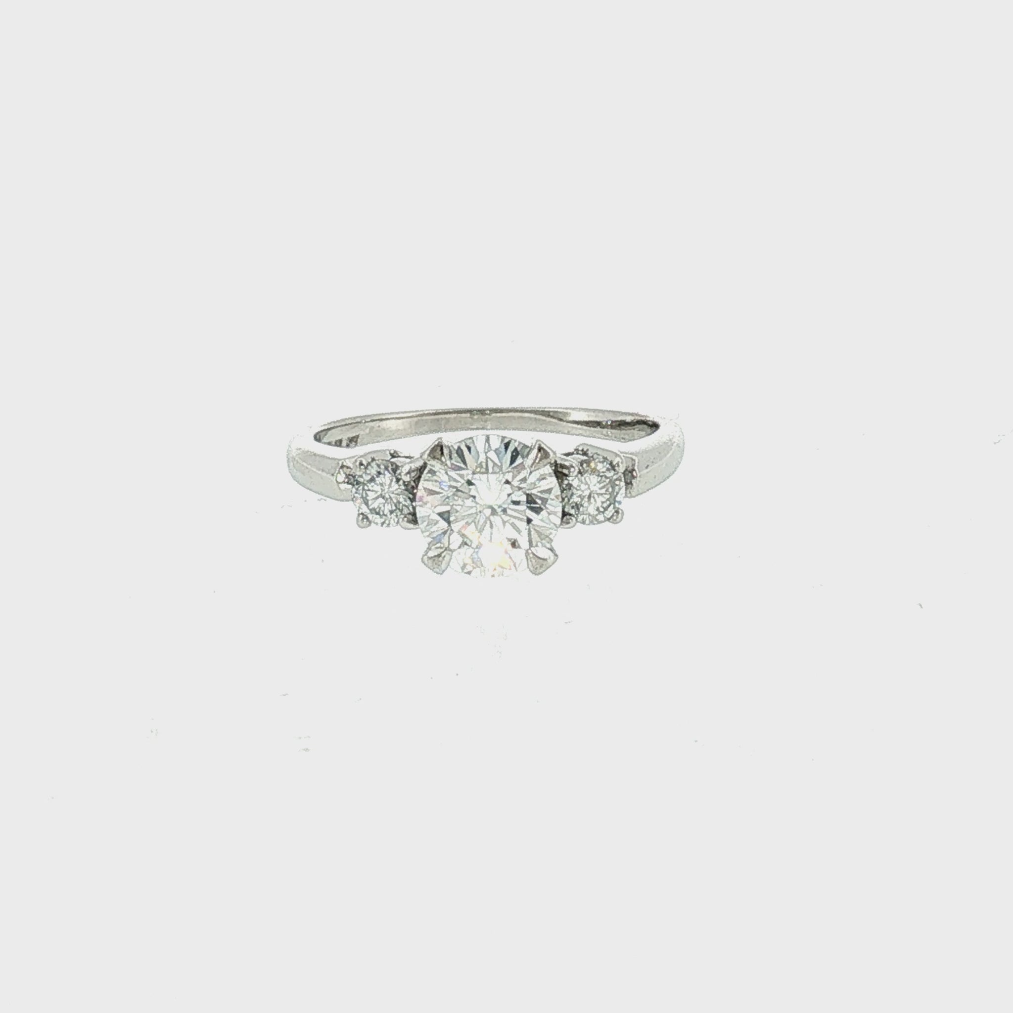 Late 20th Century Platinum 1.18 Carat Brilliant Cut Diamond 3 Across Ring