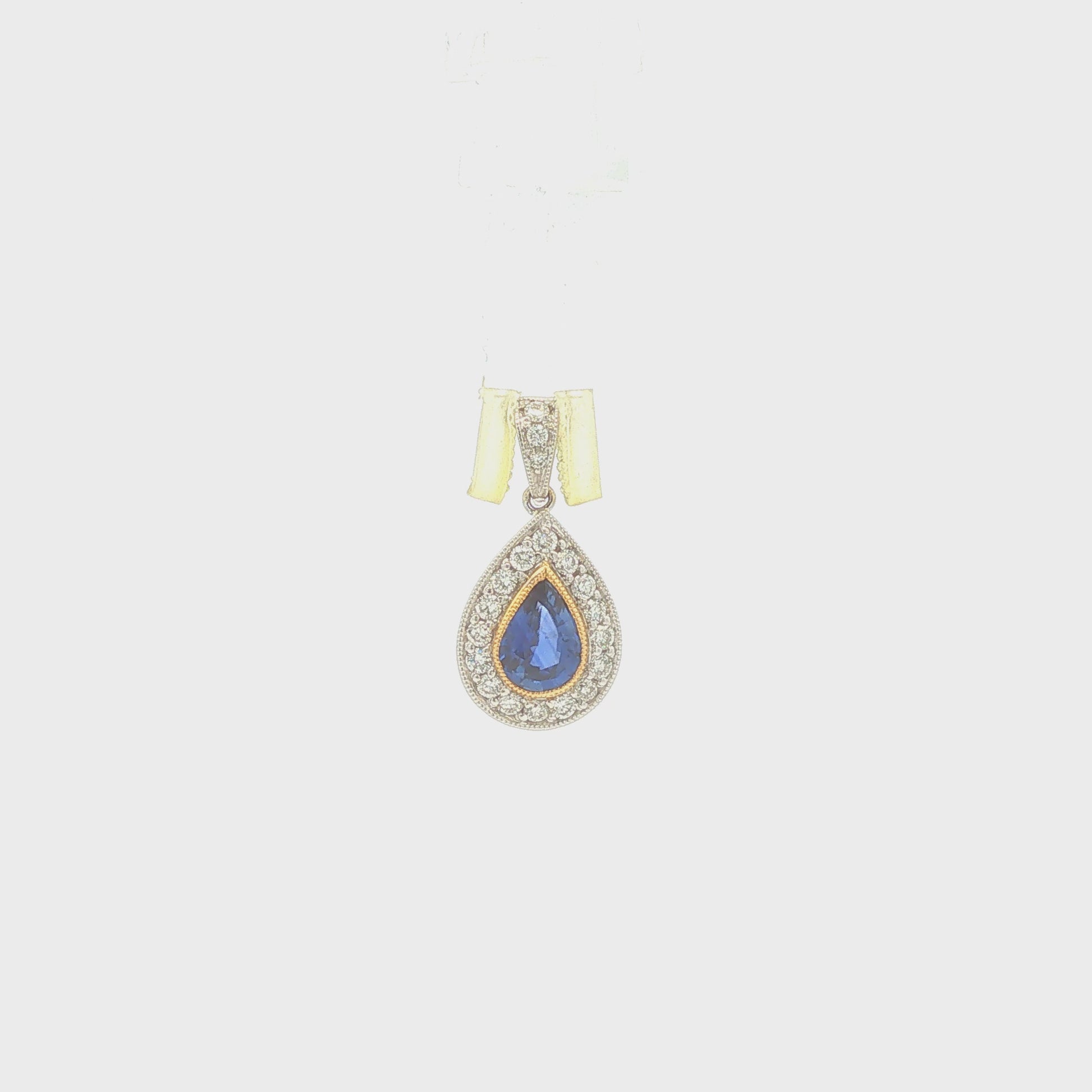 18K Gold Pear Shape Sapphire and Diamond Halo Pendant