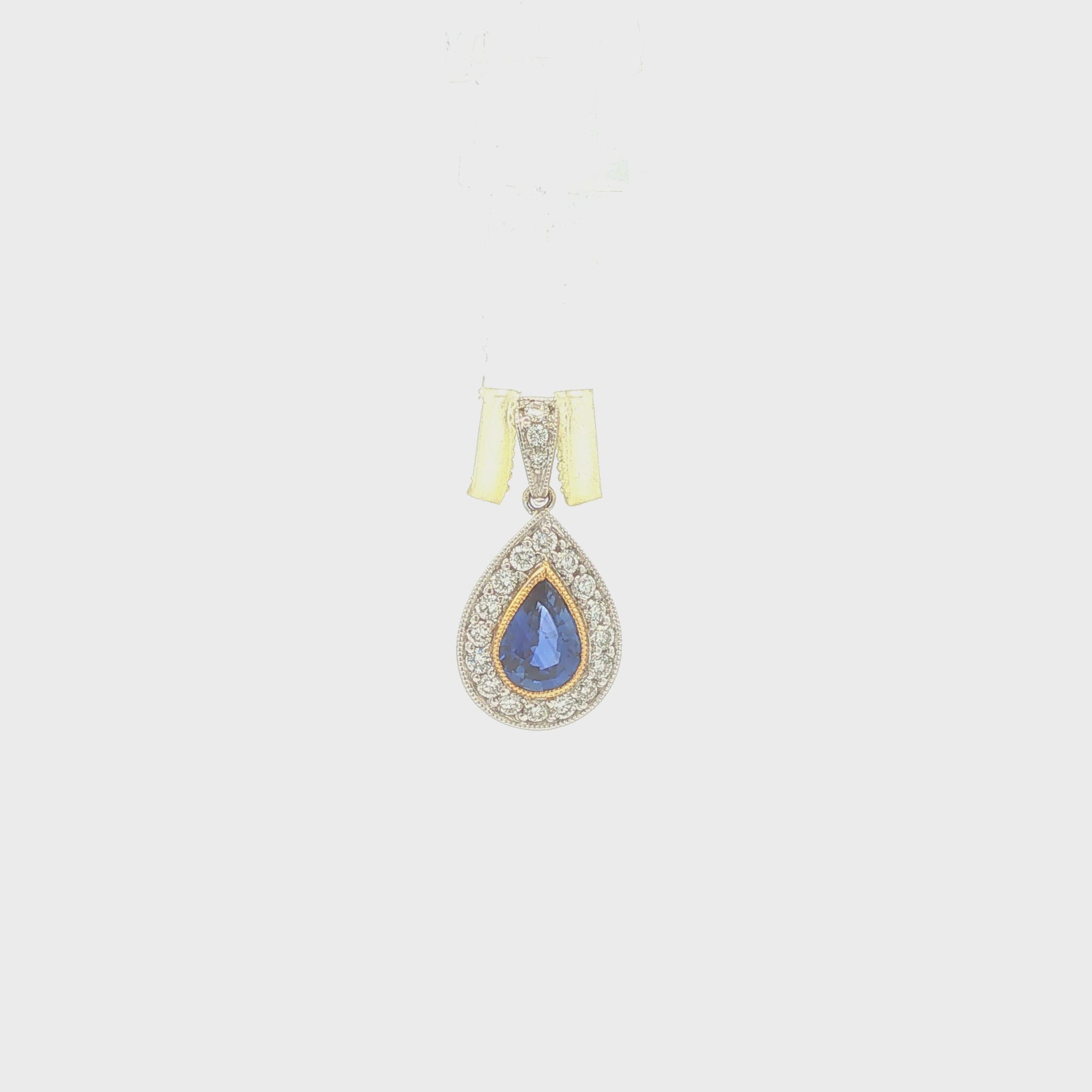 18K Gold Pear Shape Sapphire and Diamond Halo Pendant