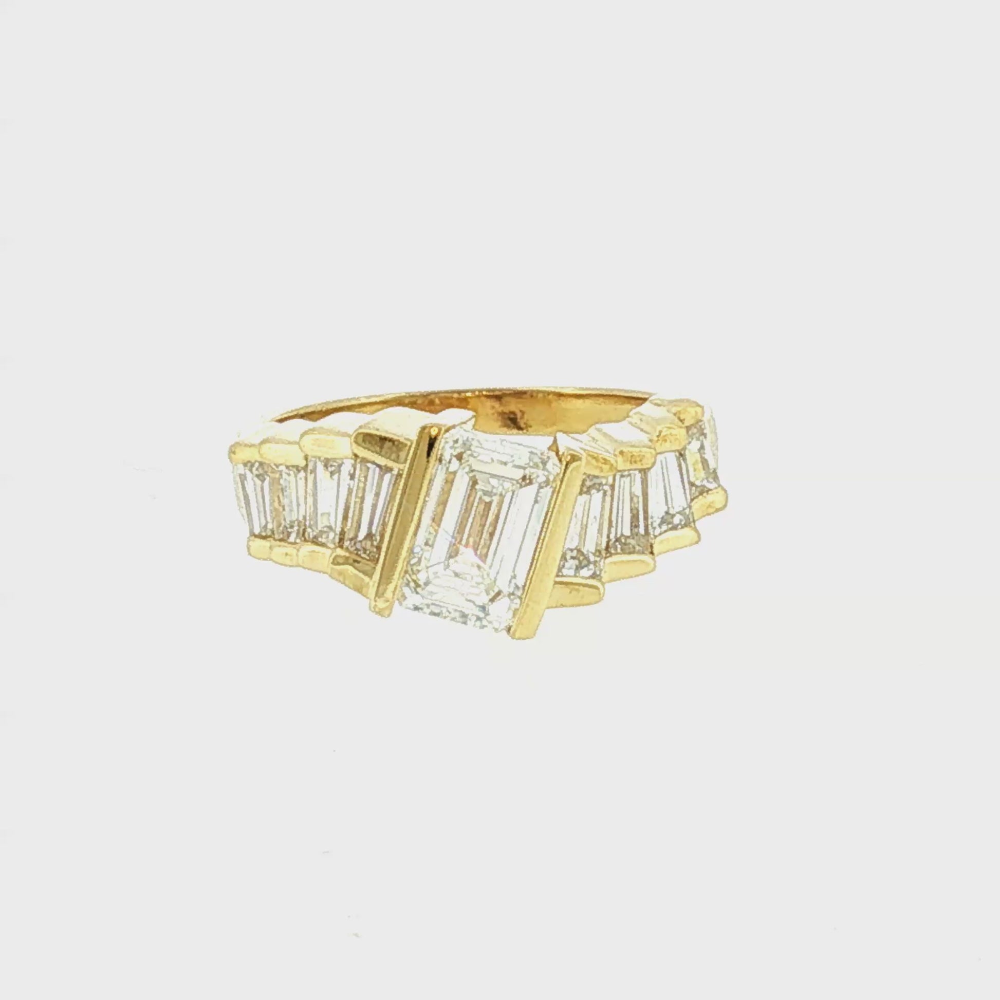 Late 20th-Century 18k Yellow Gold 1 Carat Emerald Cut Contemporary Ring