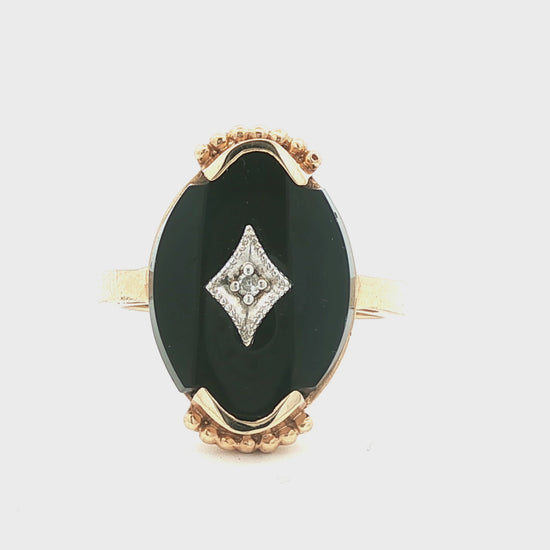 Mid-Century 10 karat yellow gold Black Onyx and Diamond Ring