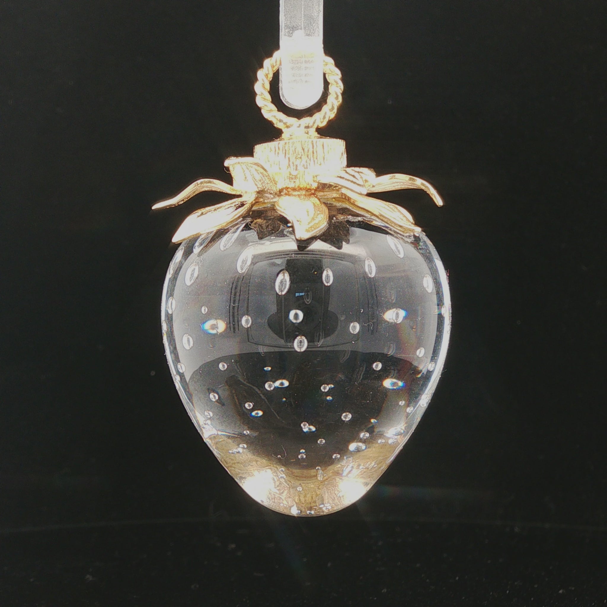 Stueben art glass strawberry with 18k petal cap