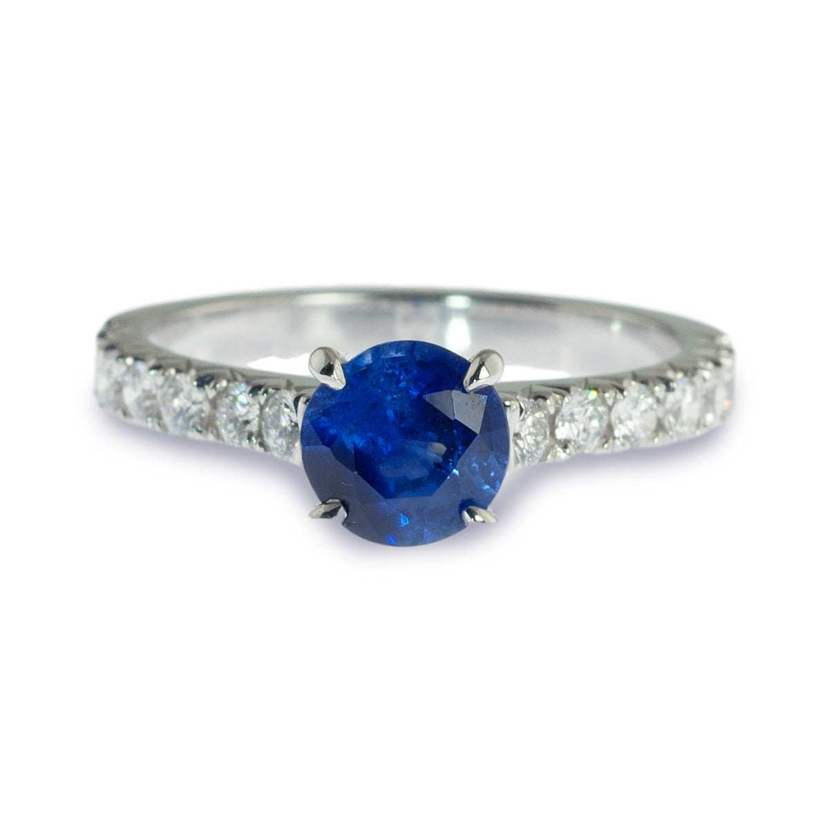 Sapphire and french set diamond ring