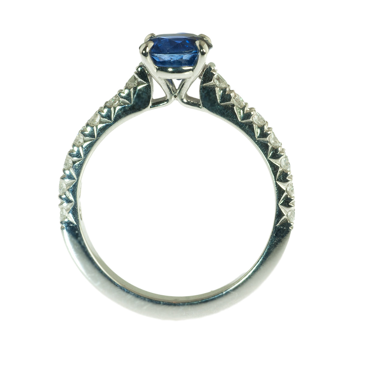 Sapphire and french set diamond ring