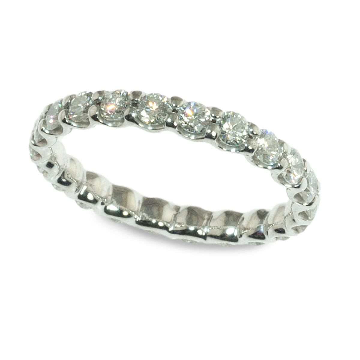 Shared prong diamond eternity ring