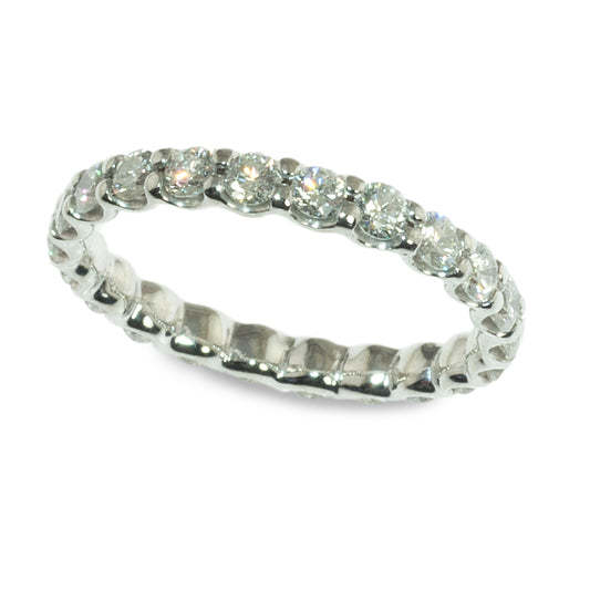 Shared prong diamond eternity ring